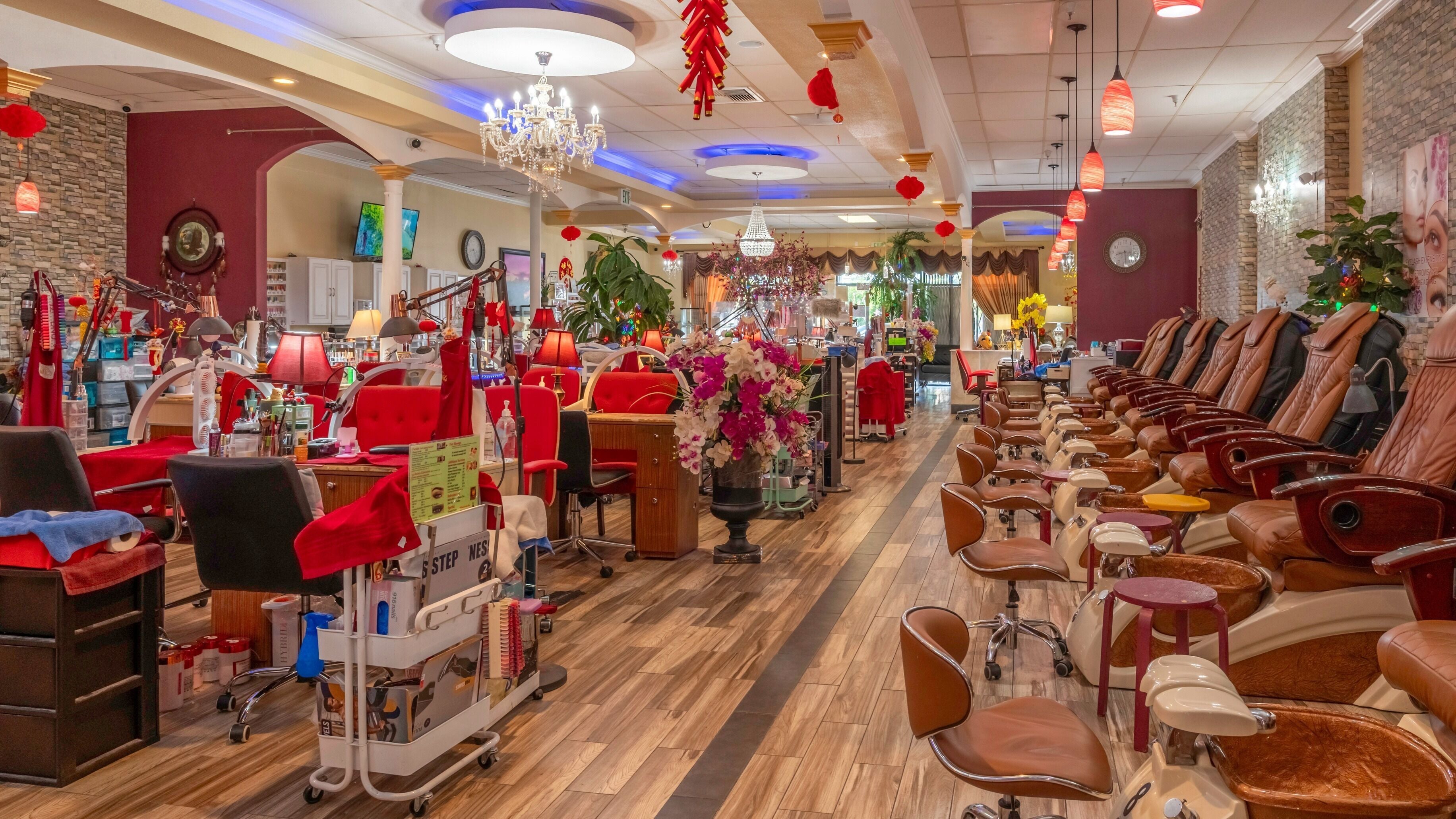 Interior of VIP Nails and Spa Official in Lodi, California, US showcasing luxurious nail stations and seating.