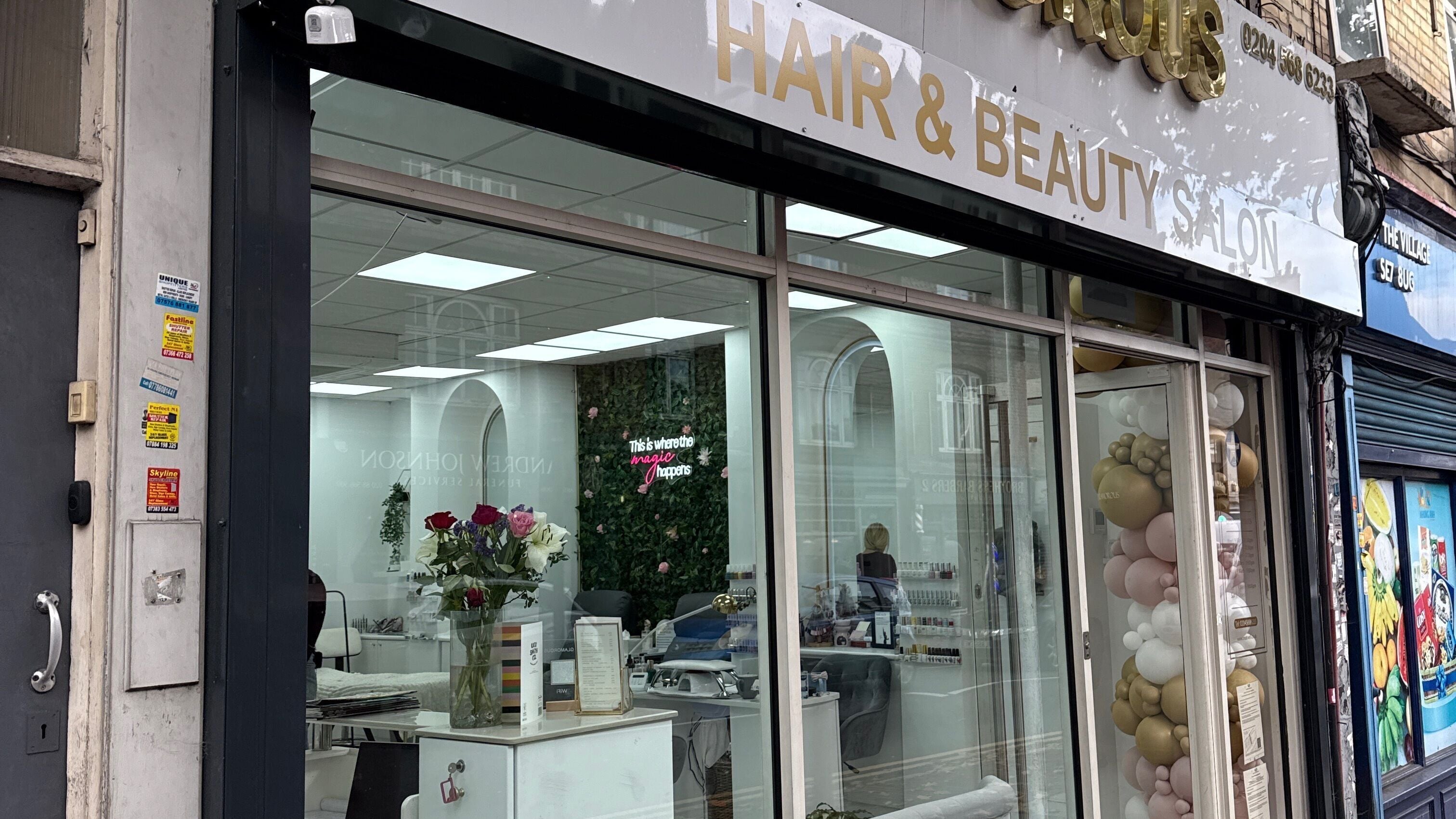 Exterior of Angel Glow by Vesi, a beauty salon in London, GB with elegant interior and floral decorations.