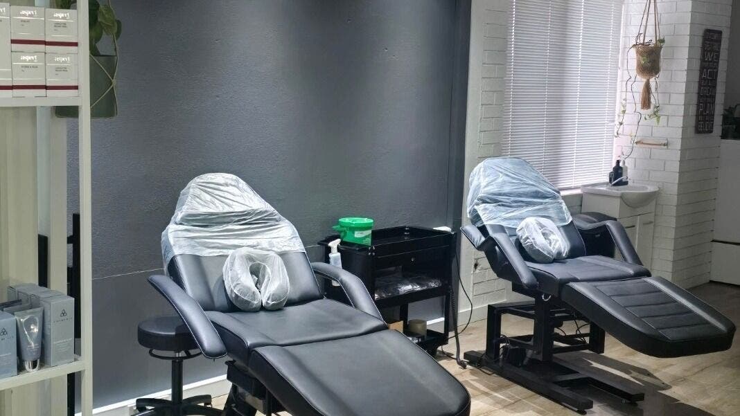 Elegant treatment chairs at Looks By Brooke Clinic, Melbourne, Victoria, AU, offering a serene wellness atmosphere.