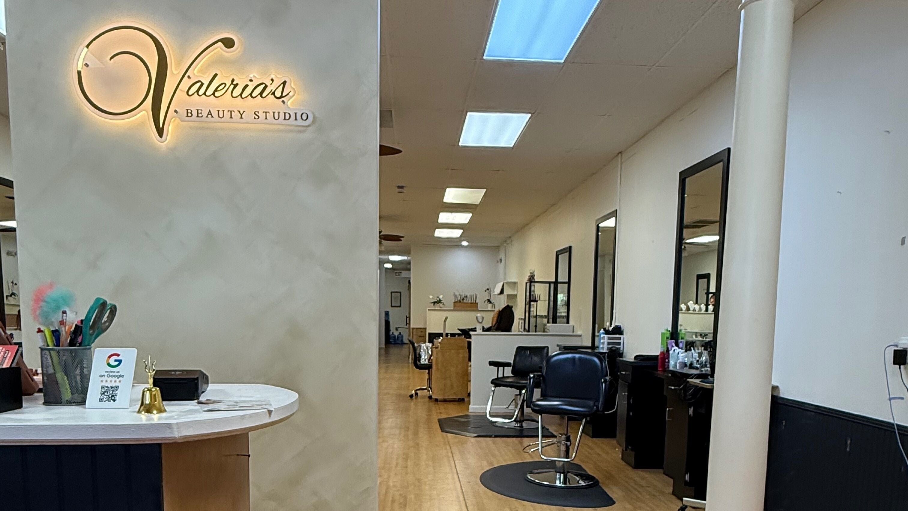 Inside Valeria’s Beauty Studio in Kennesaw, Georgia, showcasing stylish salon chairs and decor.