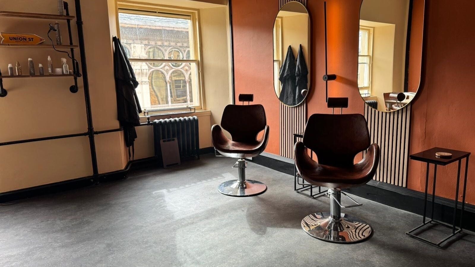 Modern salon chairs and mirrors at Megan Jack Hair Design in Glasgow, Scotland, GB.
