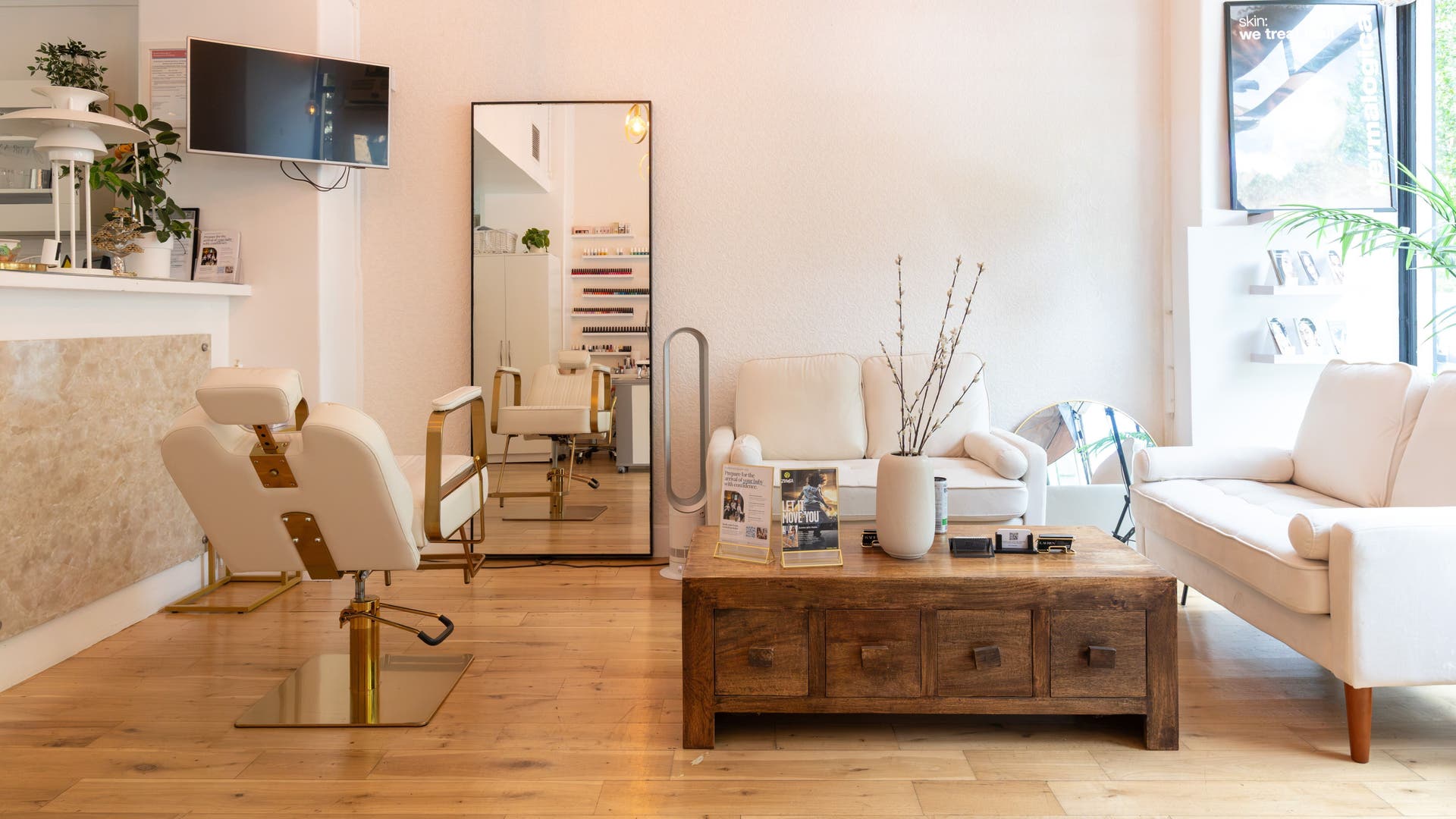 Elegant interior of SADE Aesthetics London, showcasing luxurious seating and decor, located in London, England, GB.