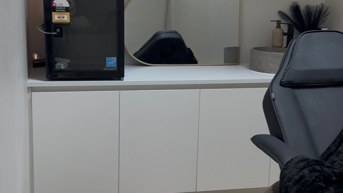 Elegant beauty station at Rejuve Esthetics, Melbourne, Victoria, AU featuring a sleek chair and modern decor.