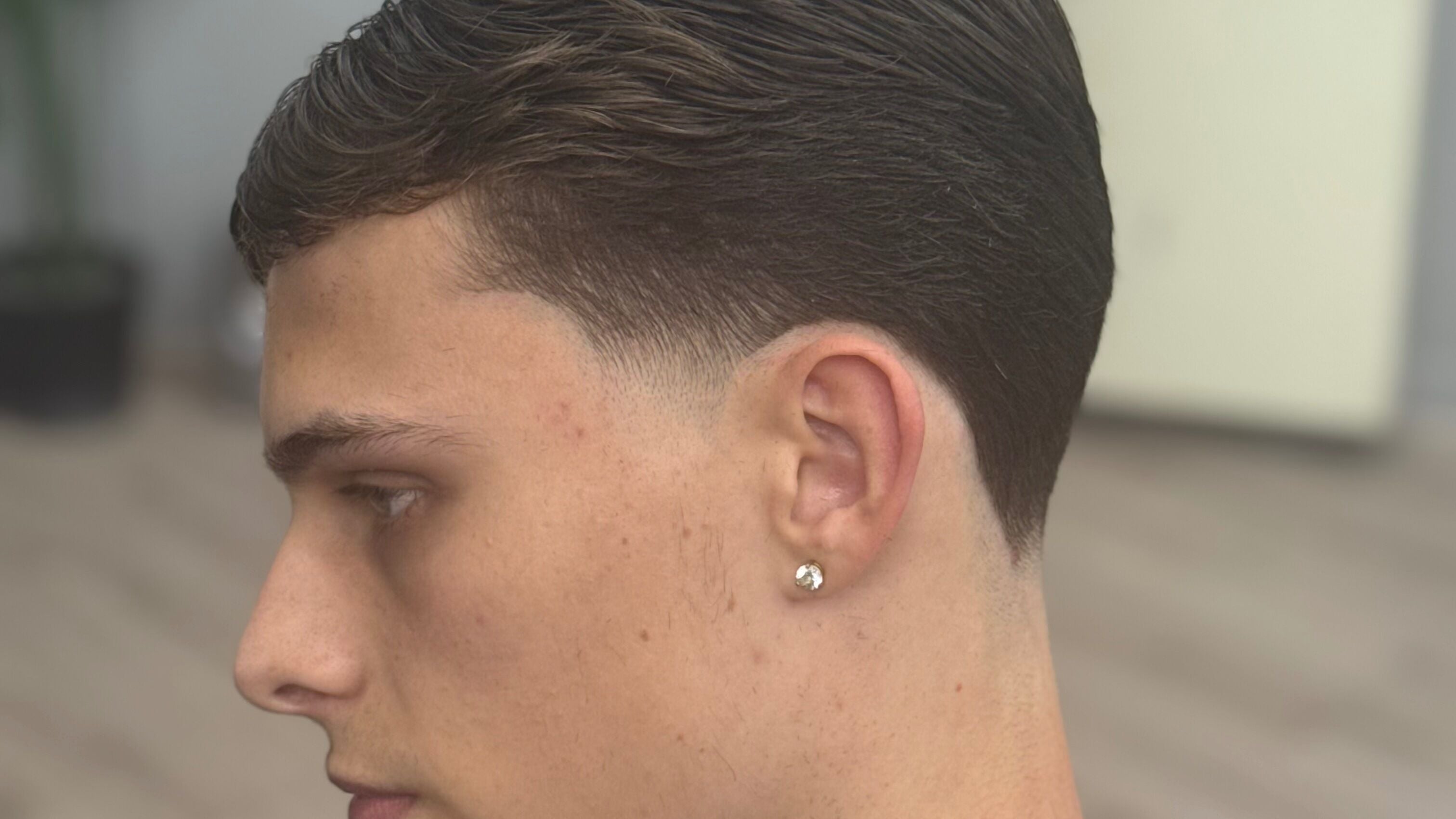 Side profile of a fresh haircut at ODCUTZ, Portlaoise, County Laois, IE highlighting clean lines.