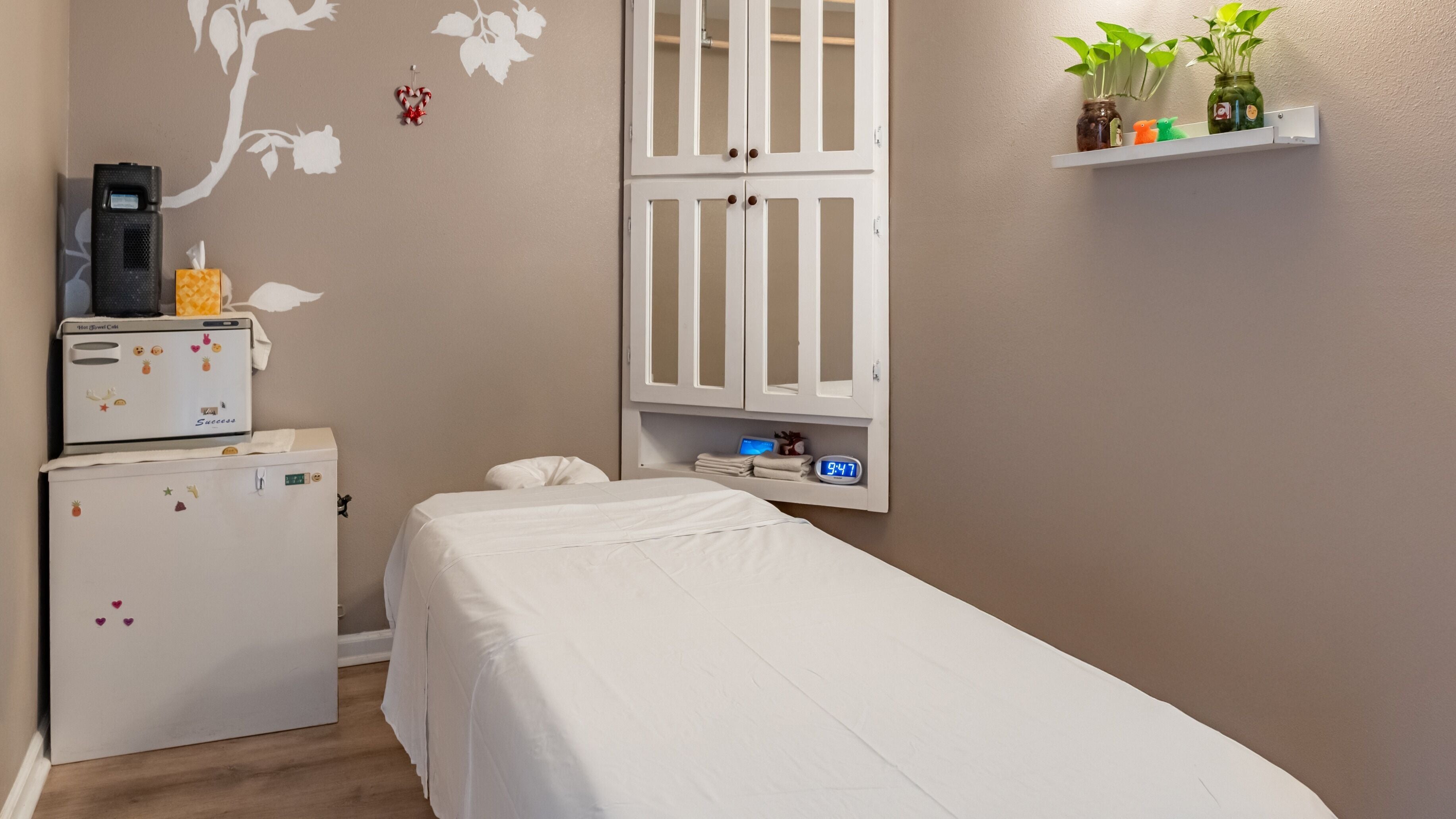 Cozy massage room at Massage One Wellness, South Pasadena, CA, US, with warm tones and calming decor.