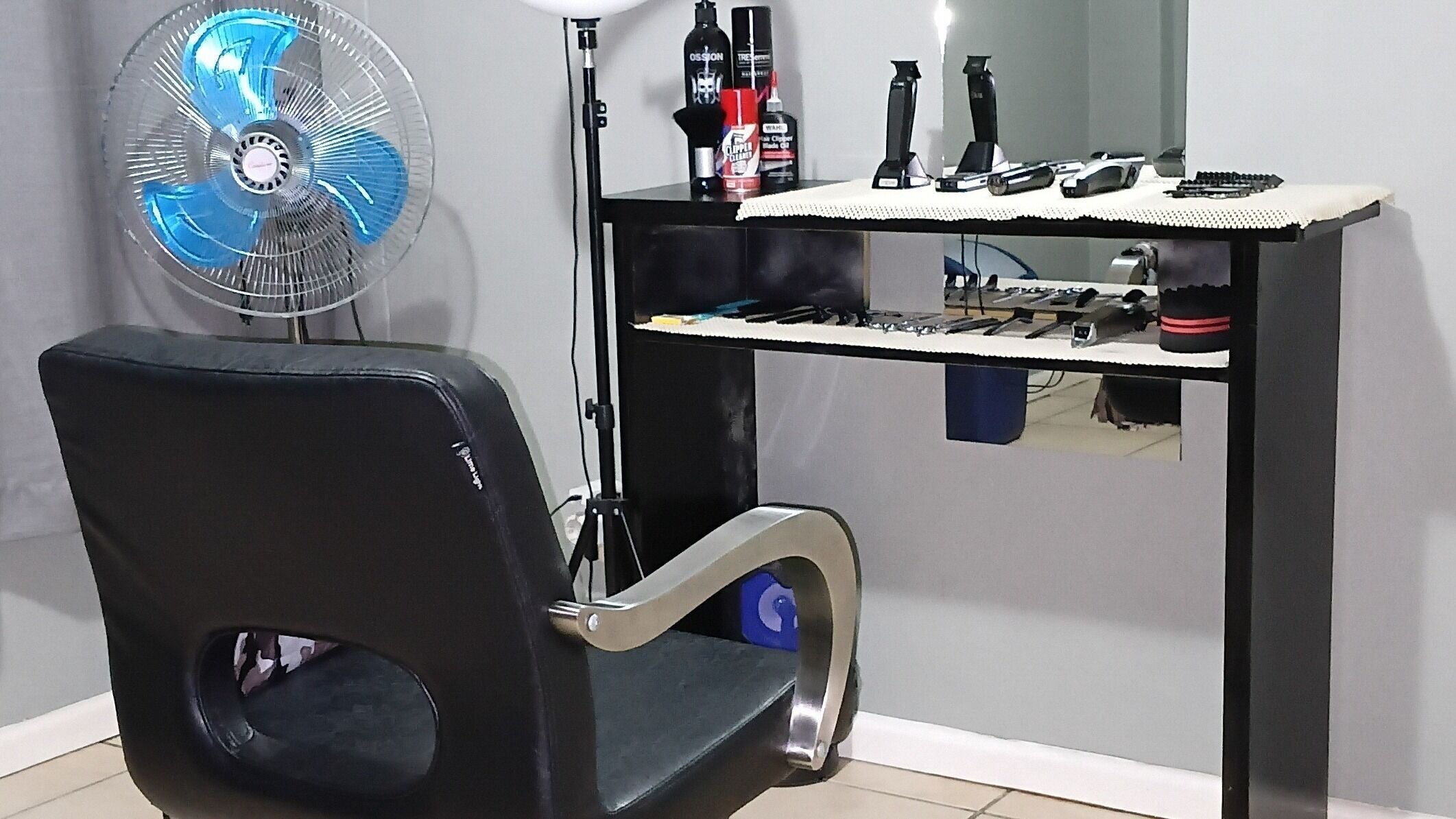 Modern barber chair and tools at ROYAL BARBERSHOP, Pretoria, Gauteng, ZA.