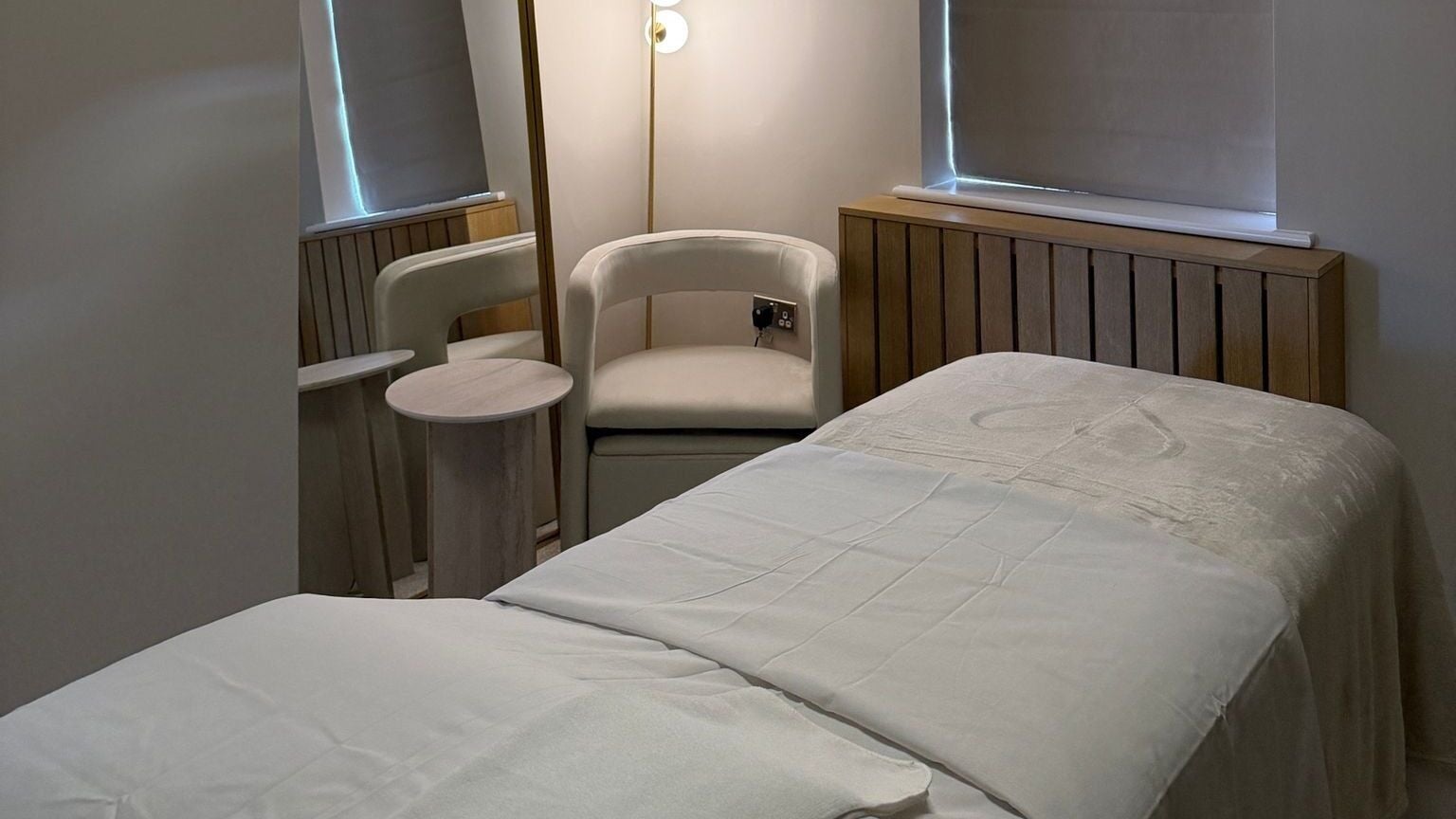 Tranquil treatment room at Figured It by Morgen in Anlaby (Home Based), Anlaby, England, GB with cozy bed and chair.