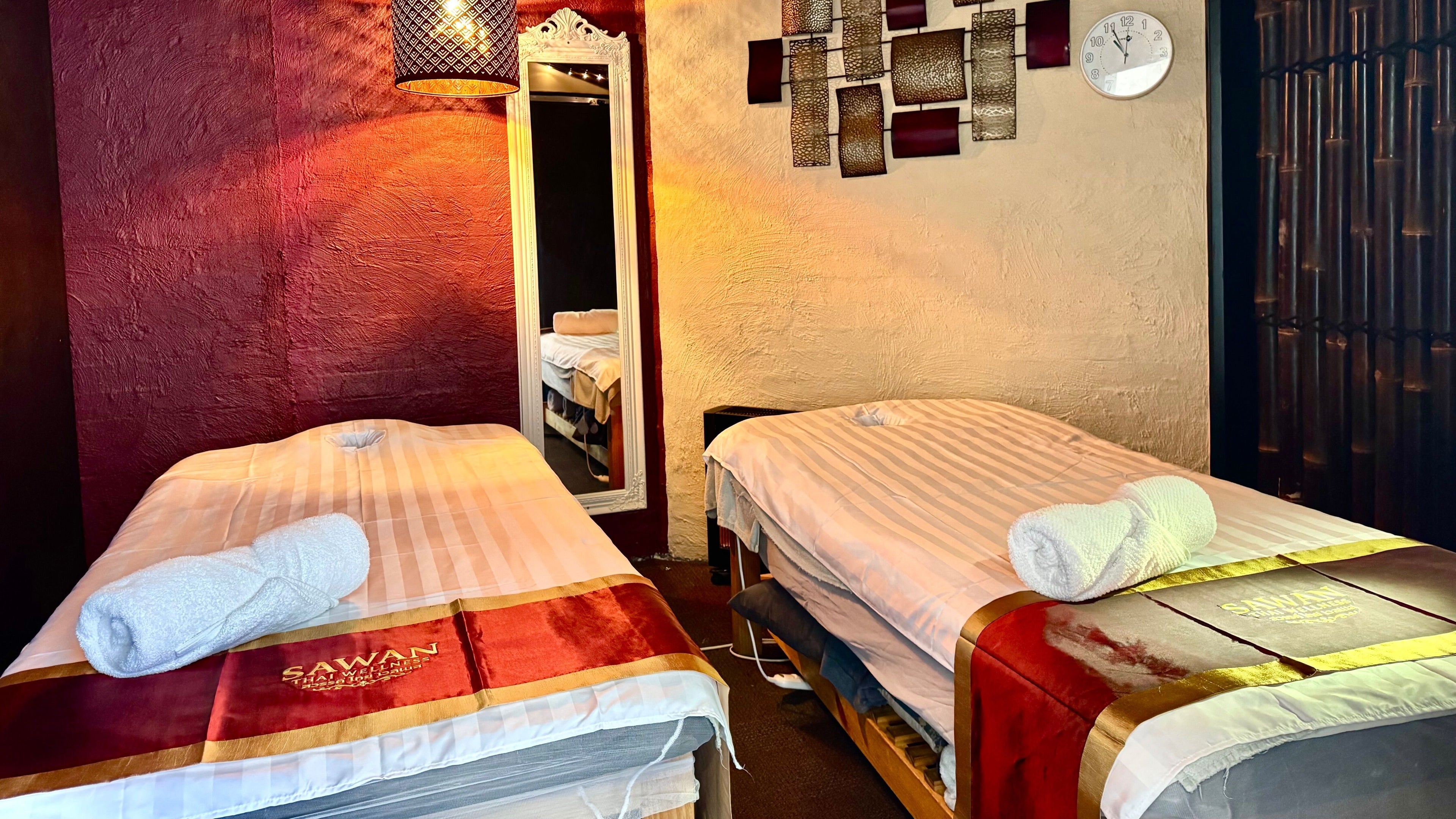 Relaxing massage room at Sawan Thai Massage & Wellness, Mornington, Victoria, AU, featuring two massage tables.