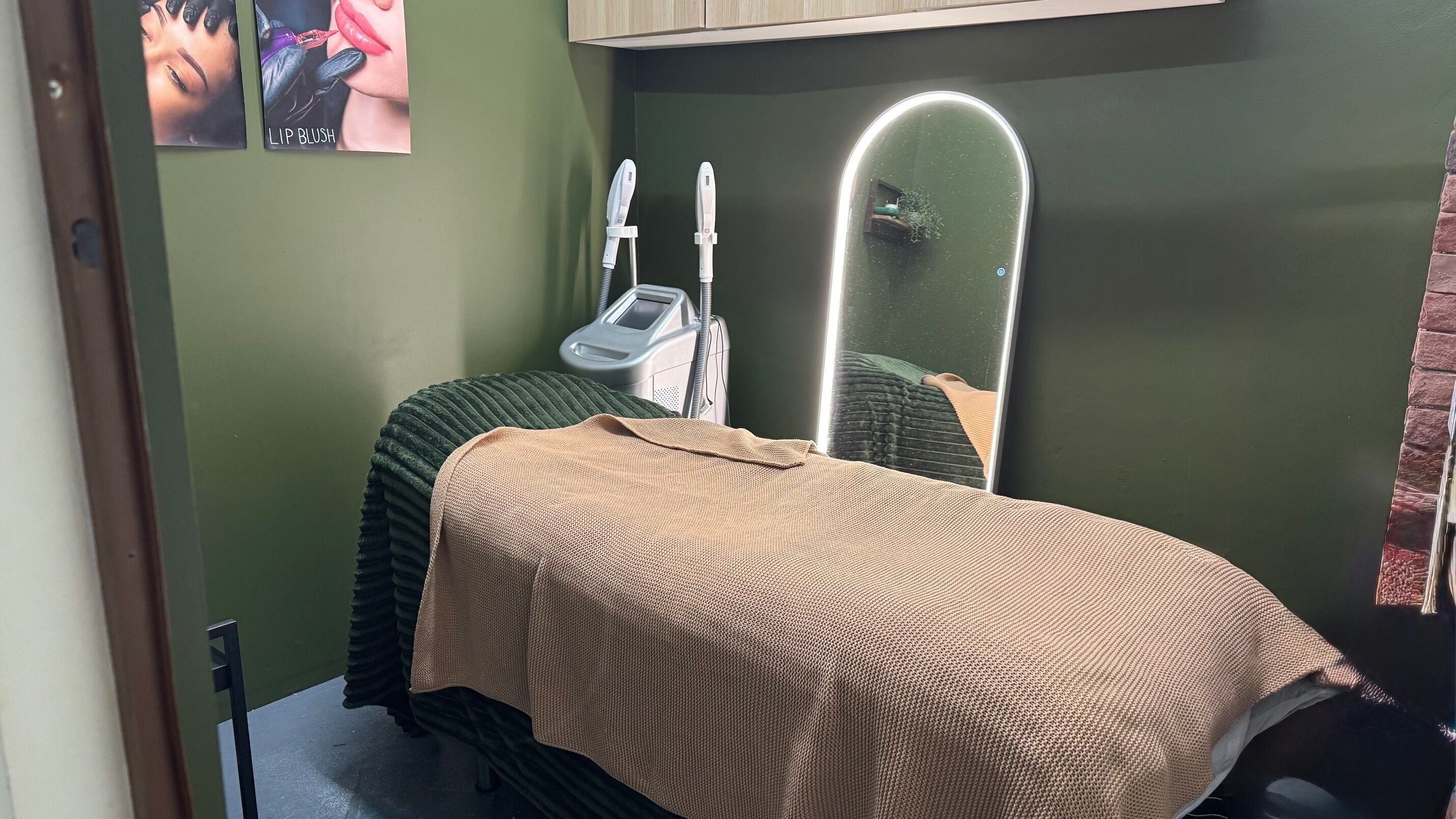 Treatment room at That Organic Salon, Sydney, NSW, AU with a plush bed and modern equipment.