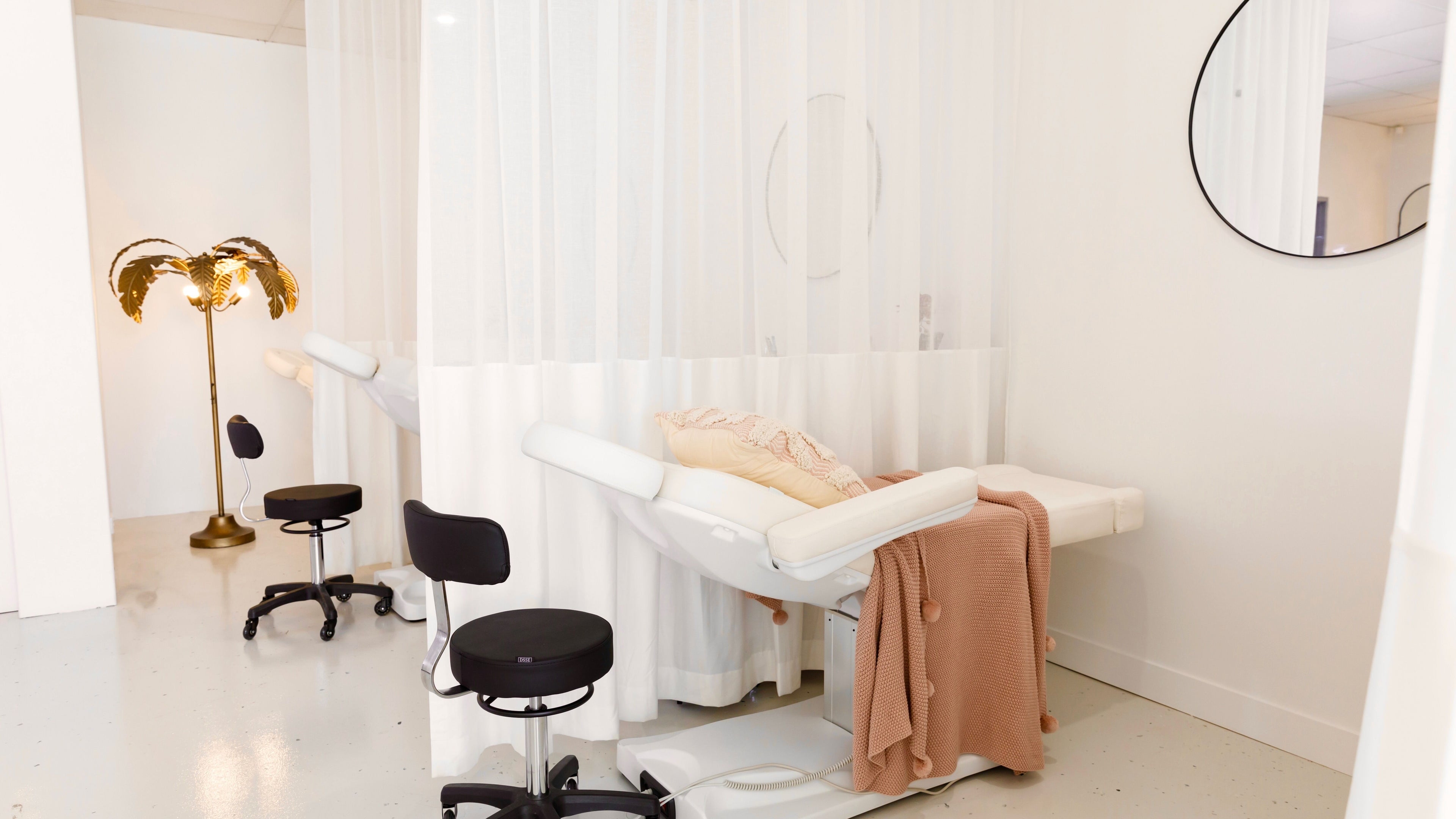 Elegant treatment room at Your Canvas, Hermit Park, Queensland, AU with plush recliner and soft lighting.