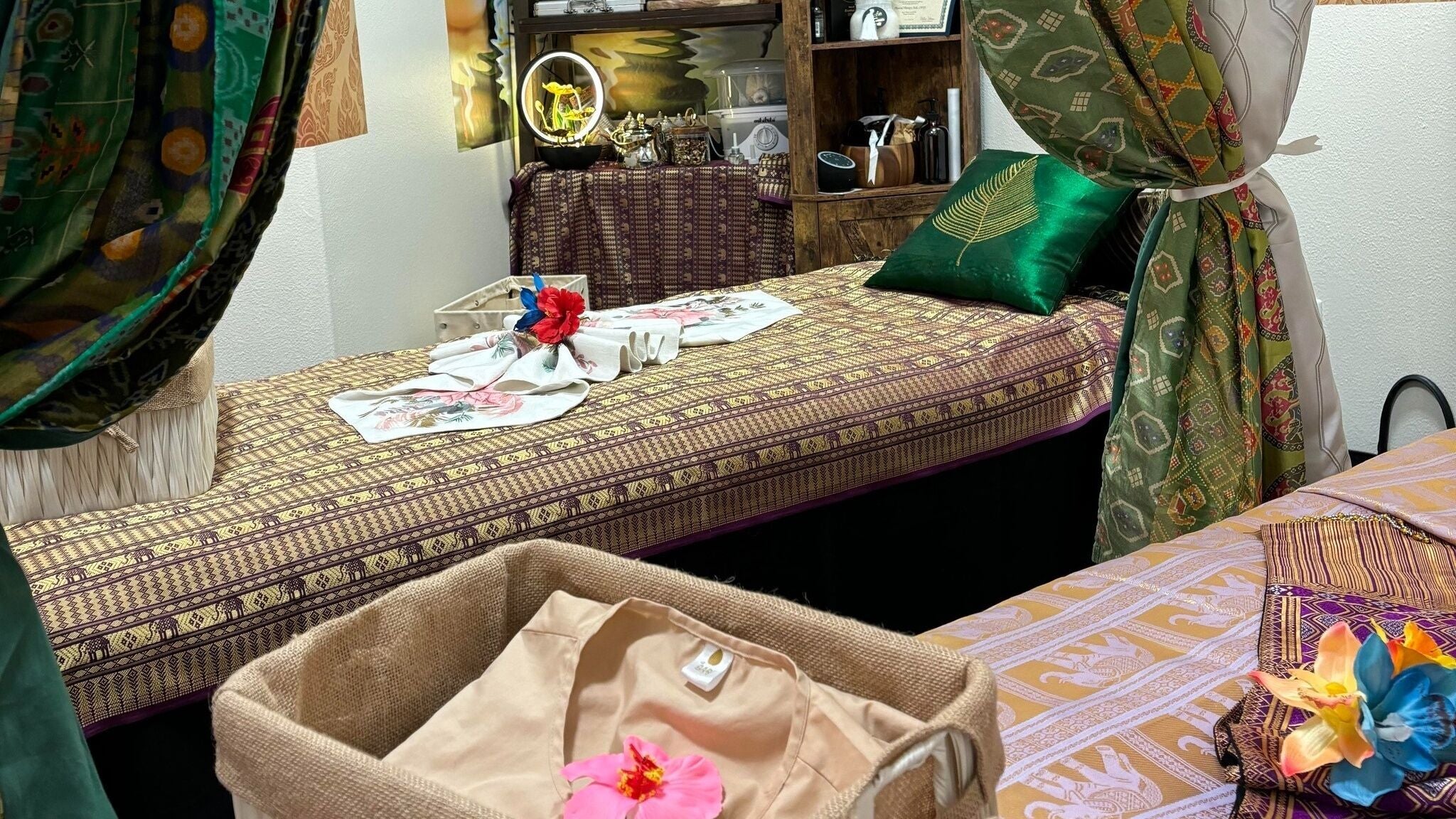 Elegant massage room at Creative Spa & Az Siam Thai Massage, Scottsdale, Arizona, US, featuring vibrant decor.