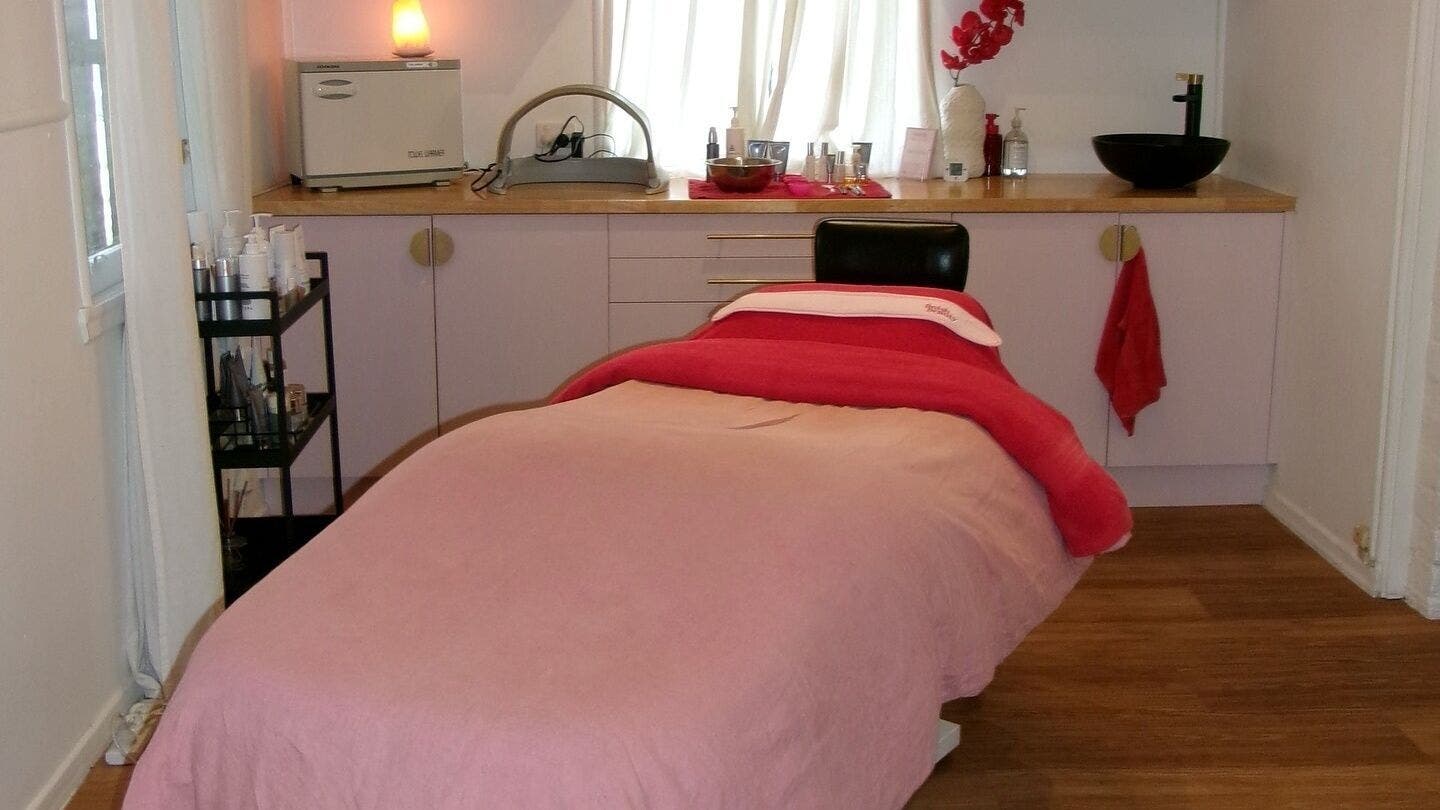 Relaxing treatment room at Finish Beauty, Paddington, Queensland, AU, featuring a comfy massage bed and soft lighting.