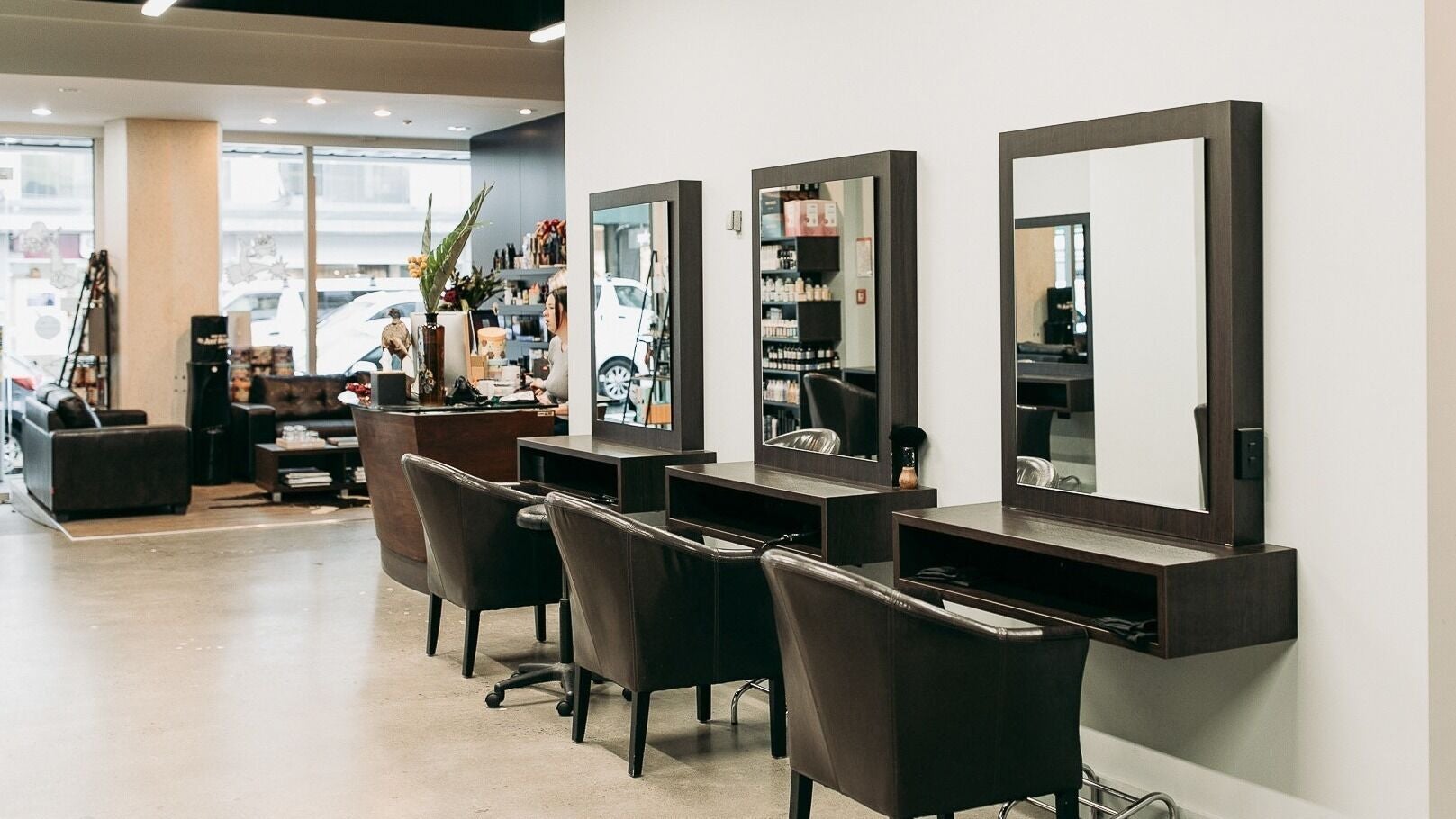 Modern salon interior at Sable in Wellington, Wellington Region, NZ with sleek styling stations.