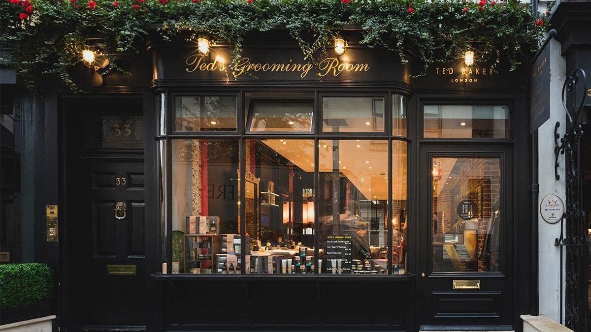 Exterior of Ted's Grooming Room on Great Queen Street, Covent Garden, London, England, showcasing elegant facade.