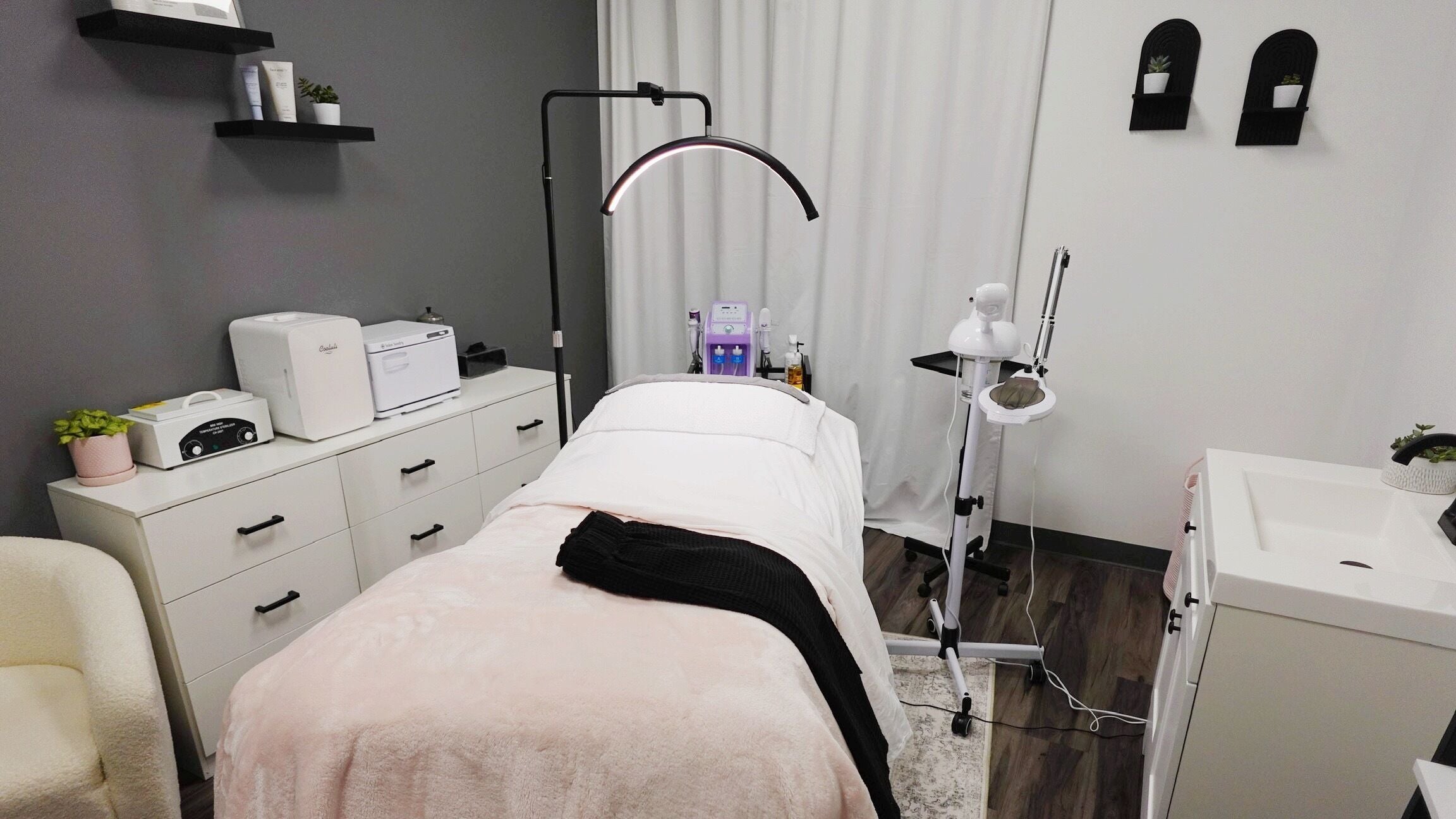 Revive Skin Studio treatment room with modern decor in San Jose, California, US.