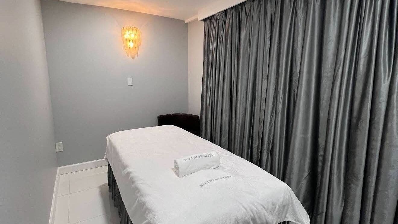 Massage room at No.1 Nassau Spa, Syosset, New York, US offers a serene setting for relaxation.