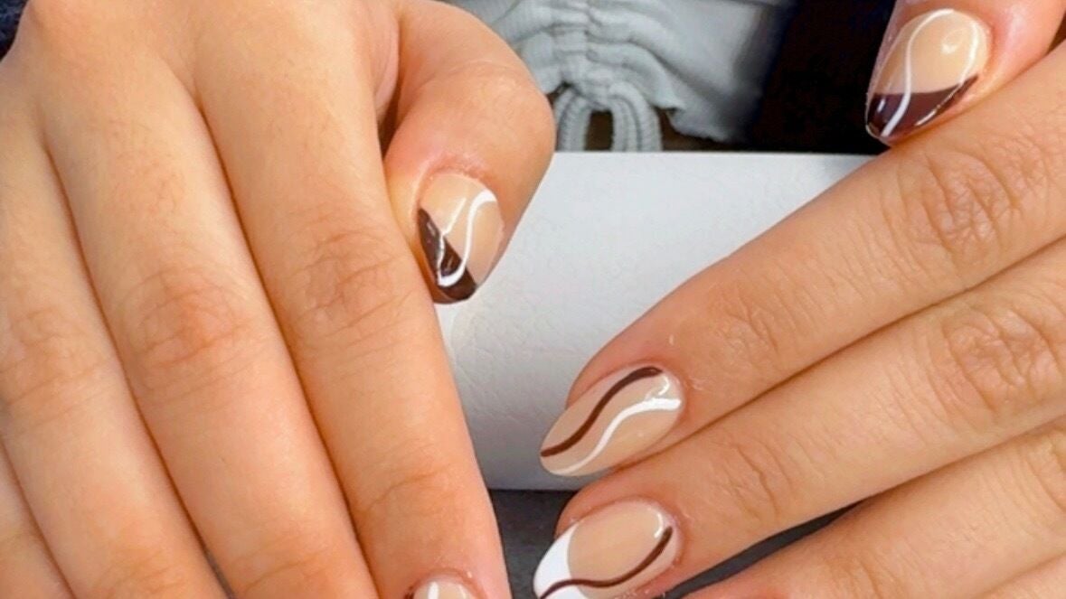 Chic nail art design at Nail by Alin, Clydebank, Scotland, GB, featuring brown and white abstract patterns.
