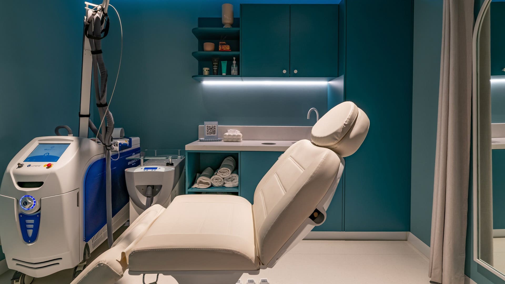 Modern treatment room at My Julie - Skin Care Clinic, Moonee Ponds, Victoria, AU with advanced equipment and cozy chair.