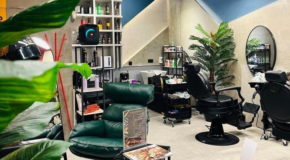 Omr Amin Salon in Riyadh features modern styling chairs, lush plants, and sleek decor for a premium experience.