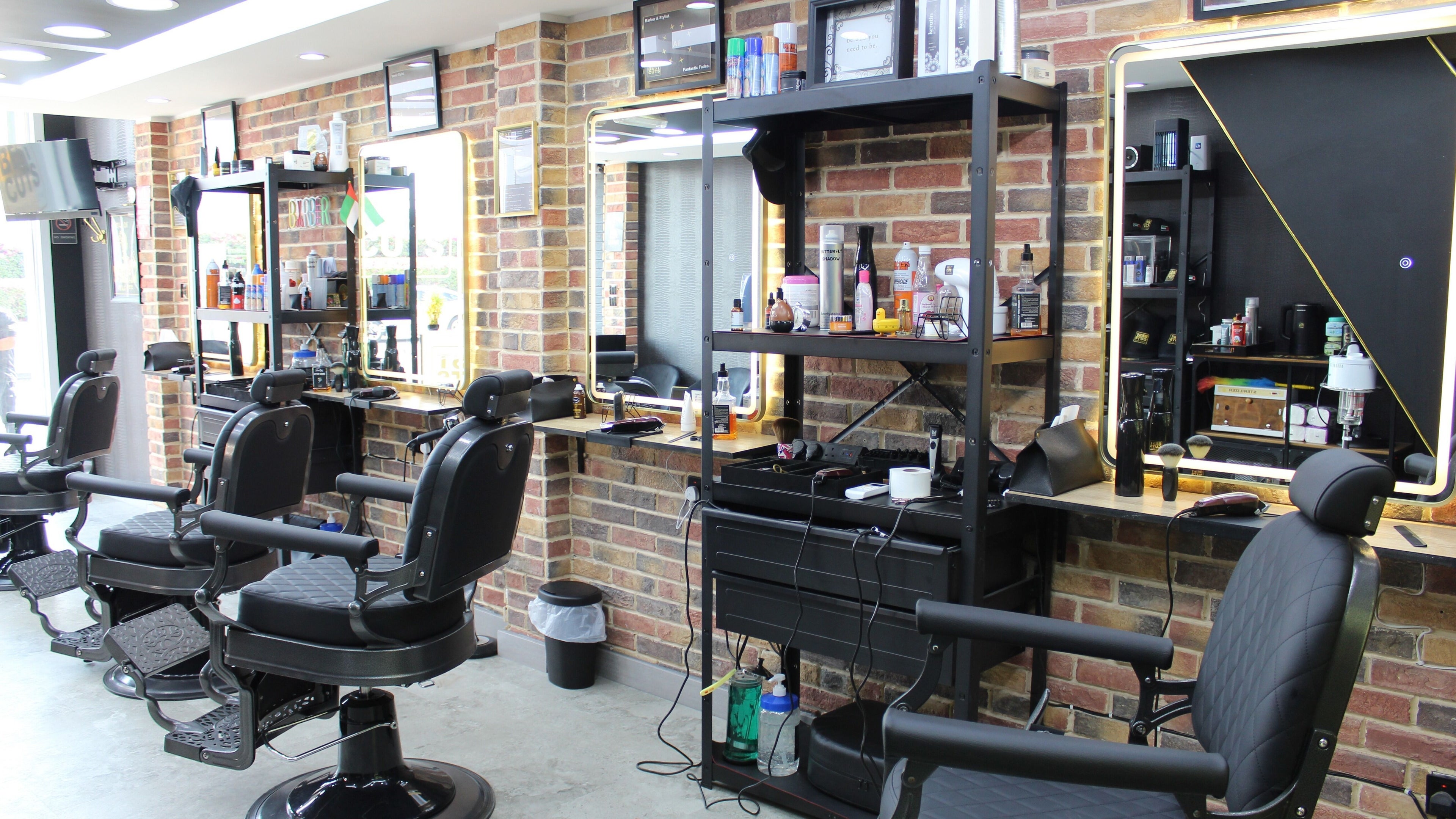 Modern grooming chairs at Best Cuts Gents Salon, Dubai, Dubai, AE, showcasing a stylish interior.
