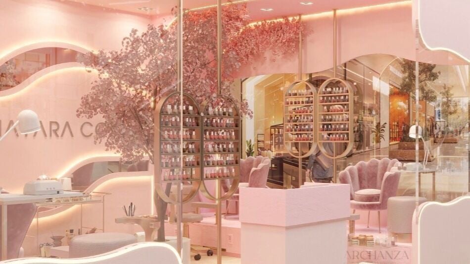 Interior elegante do Mayara Costa Nails em Loures, Lisboa, PT, com decoração rosa sofisticada.