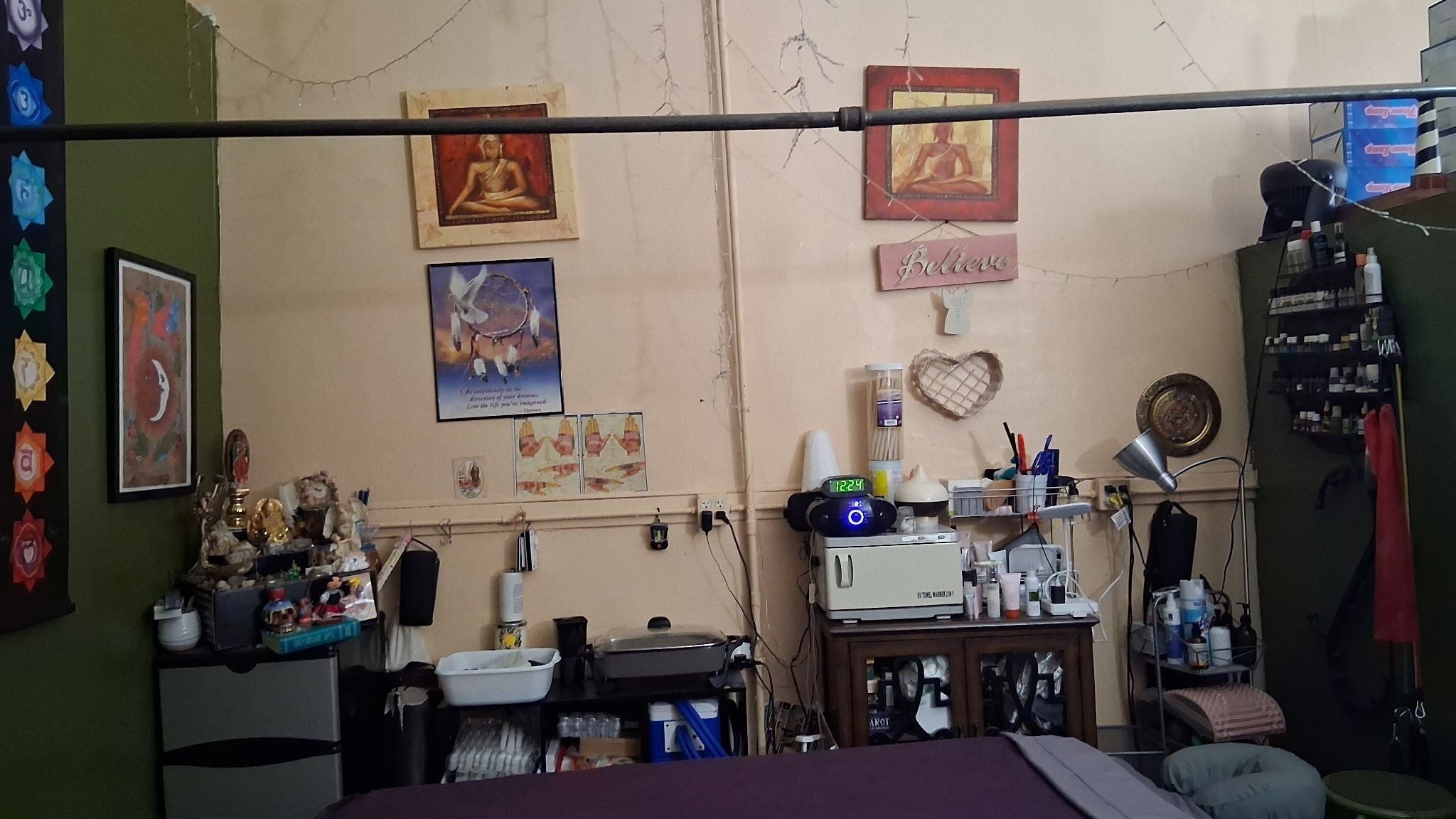 Relaxing decor at Holistic Pathways Massage, Chicago, Illinois, US, featuring calming wall art and massage tools.