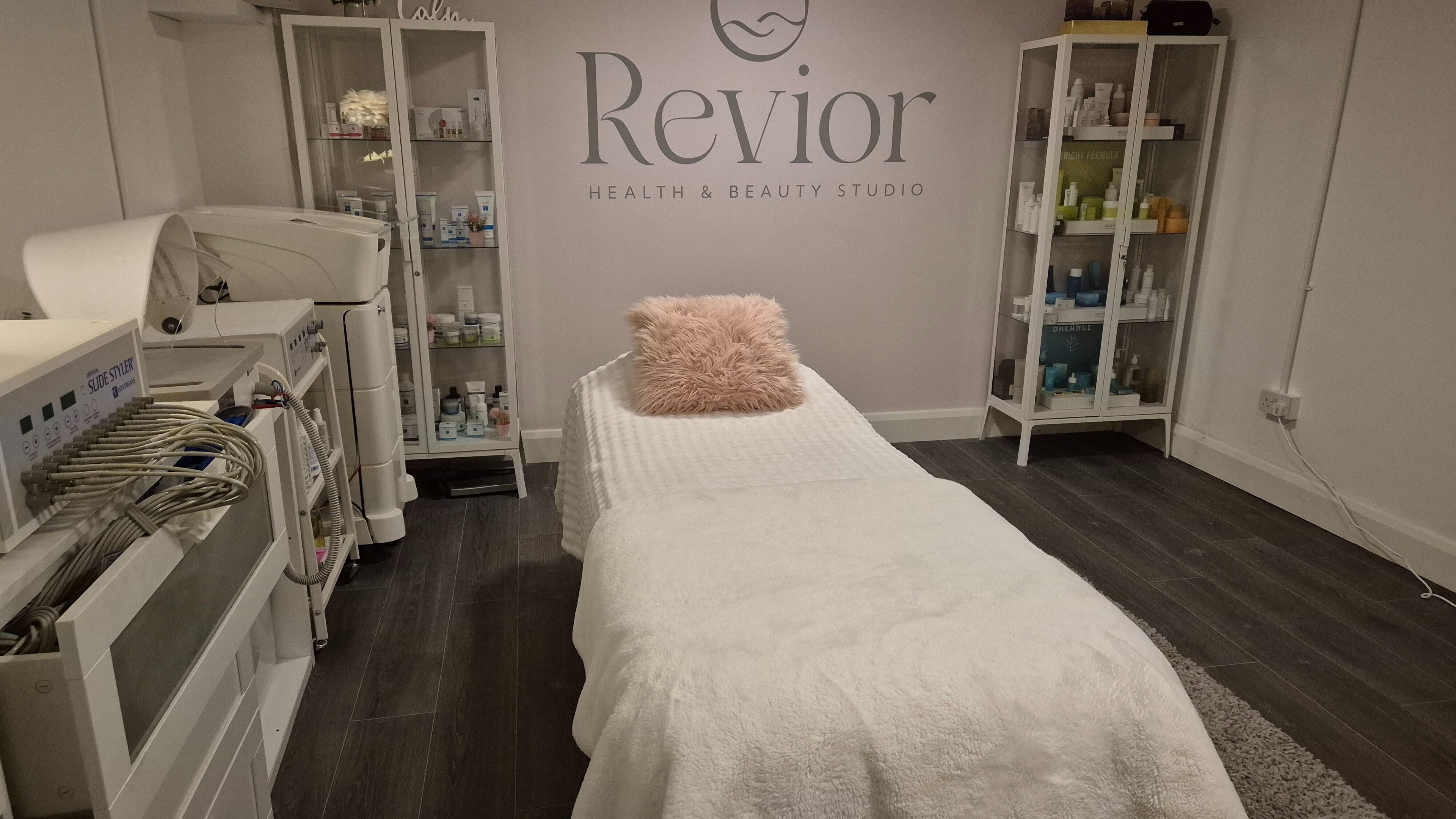 Relaxing treatment room at Revior Health & Beauty Studio, Limerick, County Limerick, IE, featuring cozy decor.