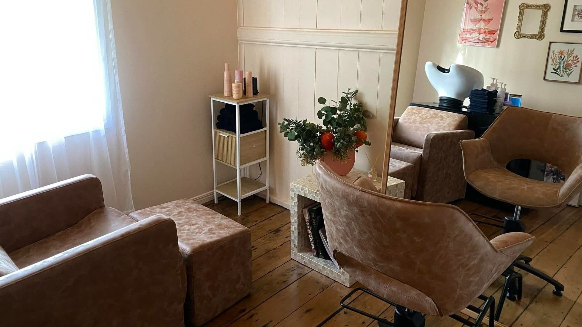 Warm and inviting salon interior at Banksia and Brush Hair Co in Bundamba, Queensland, AU.