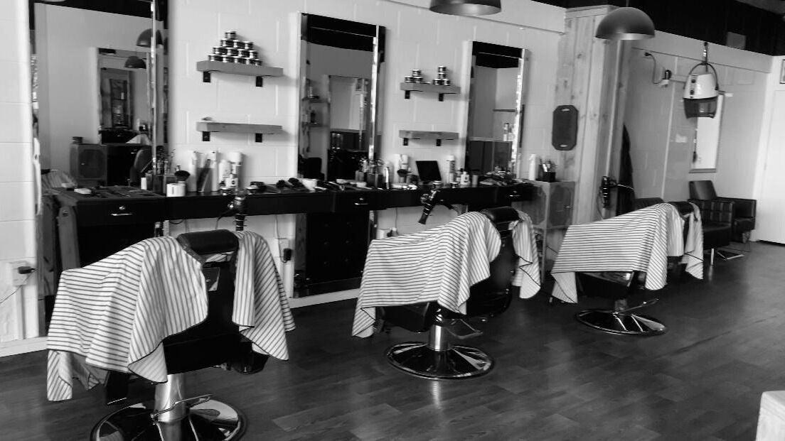 Chic interior of Heads Barber in Auckland, Auckland, NZ, featuring vintage barber chairs.