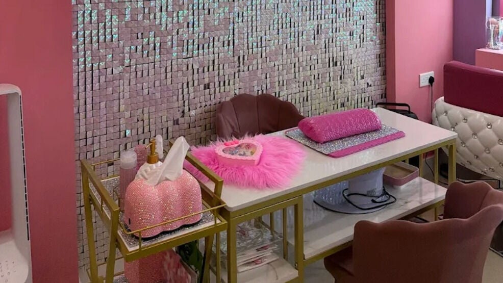 Chic nail bar with pink decor at Starkids | Circle Mall, Dubai, AE. Perfect for beauty treatments.