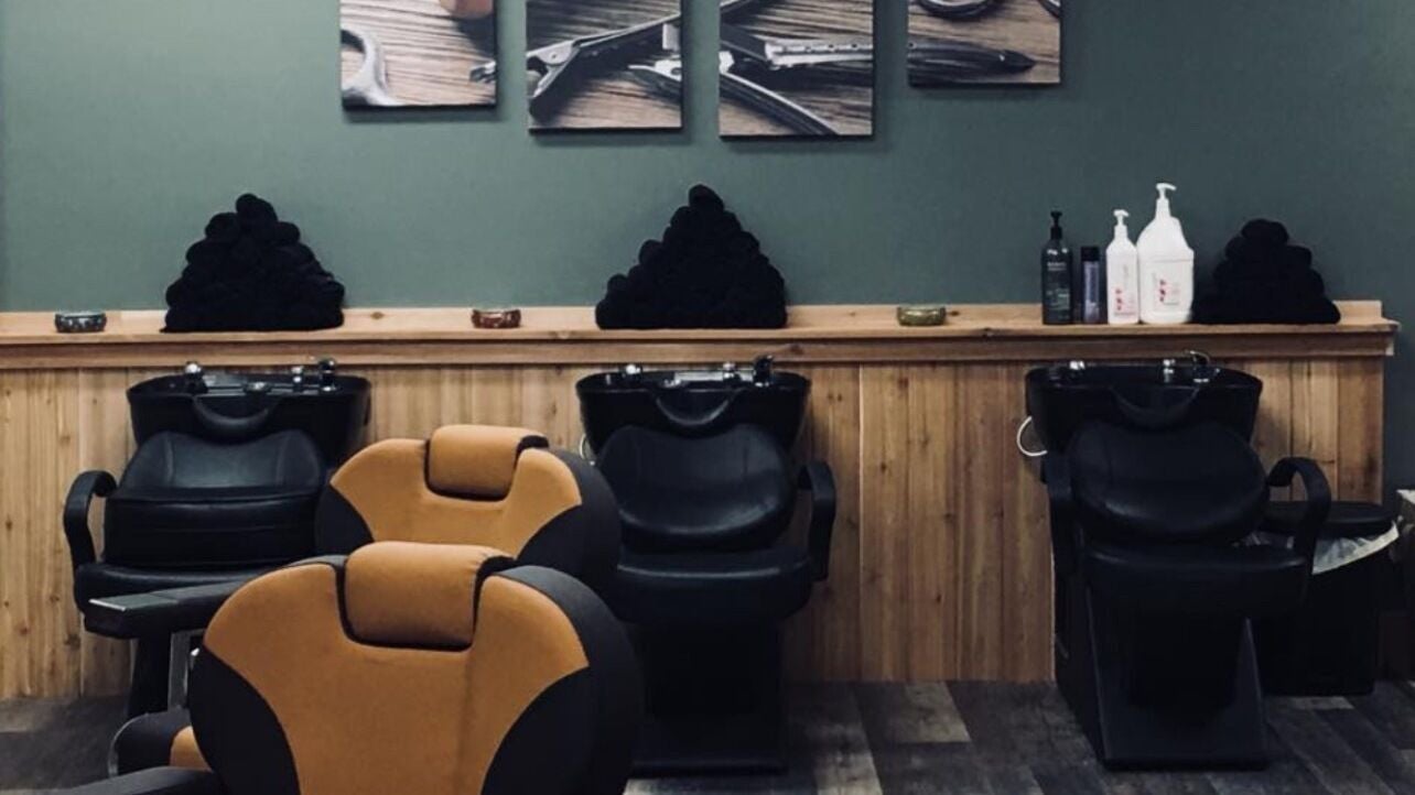 Modern salon chairs and wash stations at Studio 815, Genoa, Illinois, US.