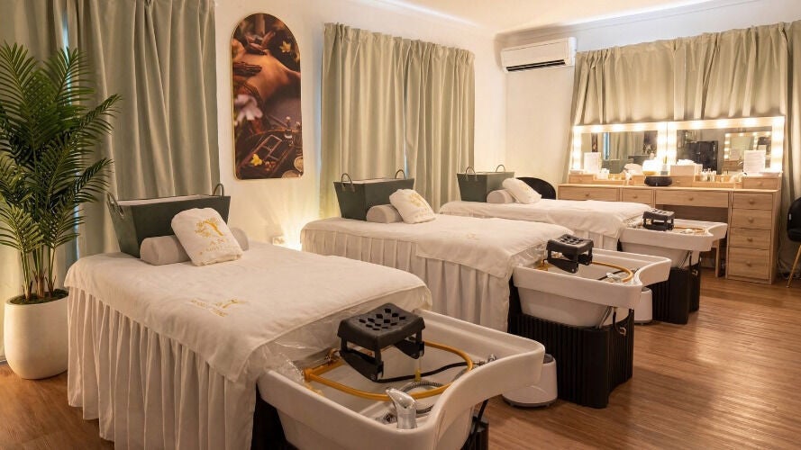 Peaceful treatment room at AN Head Spa and Wellness, Upper Mount Gravatt, Queensland, AU, featuring three spa beds.