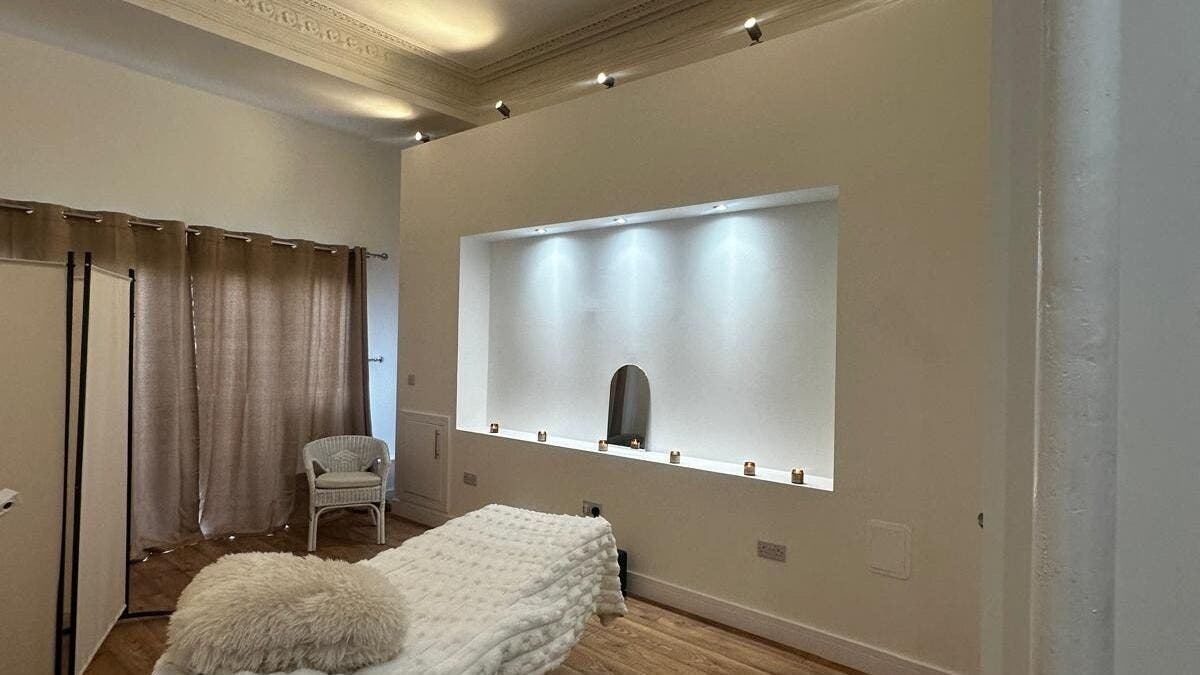 Relaxing massage room at Luxe Skin and Laser Lounge Cathcart, Glasgow, Scotland, GB, with serene decor.