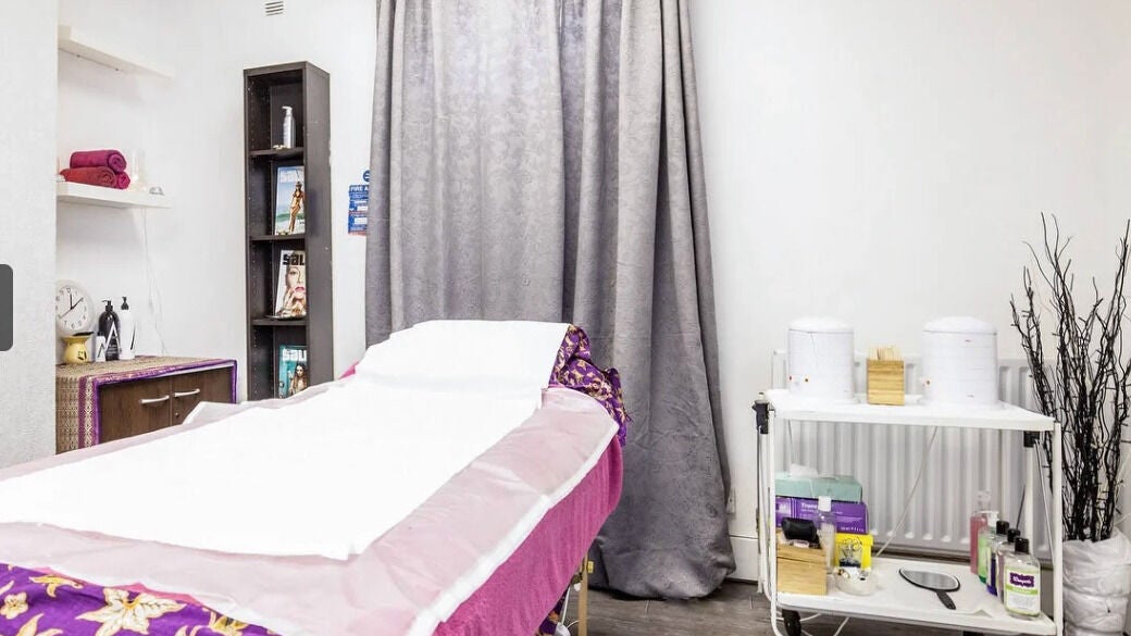 A tranquil treatment room with massage bed at Affable Treatments, Croydon, England, GB.