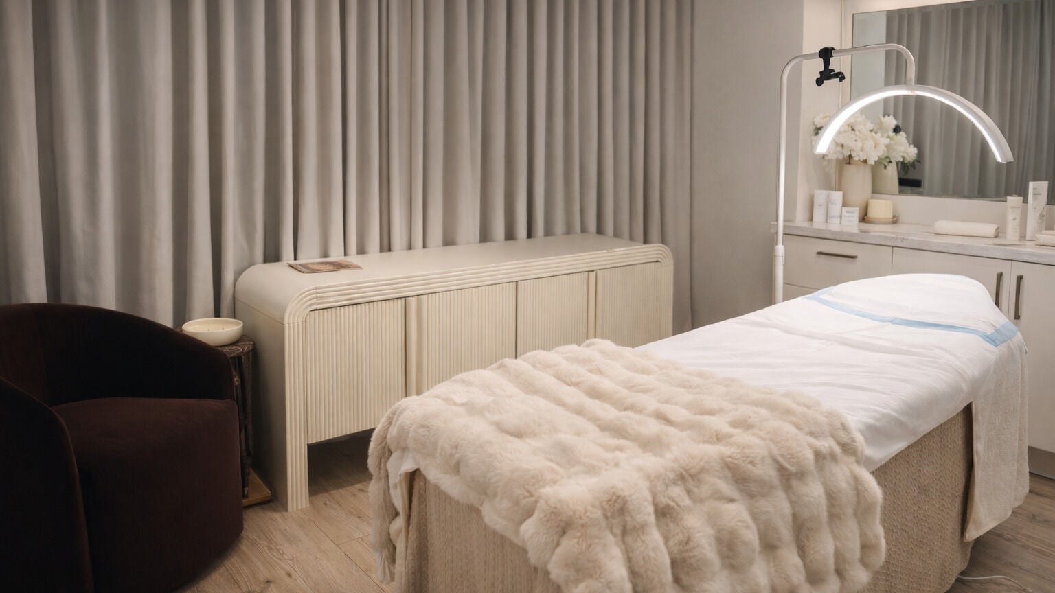 Luxurious spa room at St James Aesthetics Moonee Ponds, Melbourne, Victoria, AU, with a plush massage table.