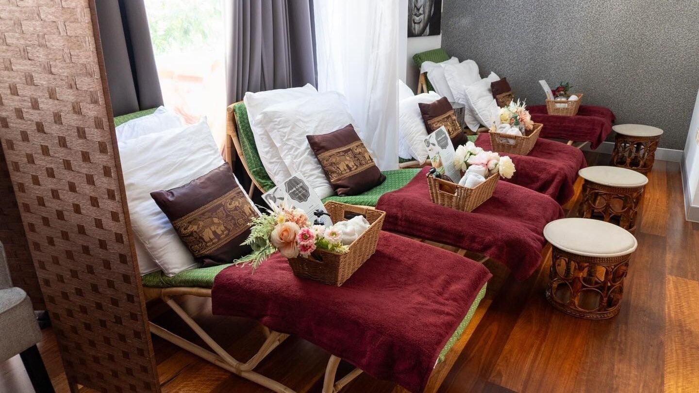 Luxurious spa chairs with cushions and baskets at Royal Lotus Thai Spa, Kangaroo Point, Queensland, AU.