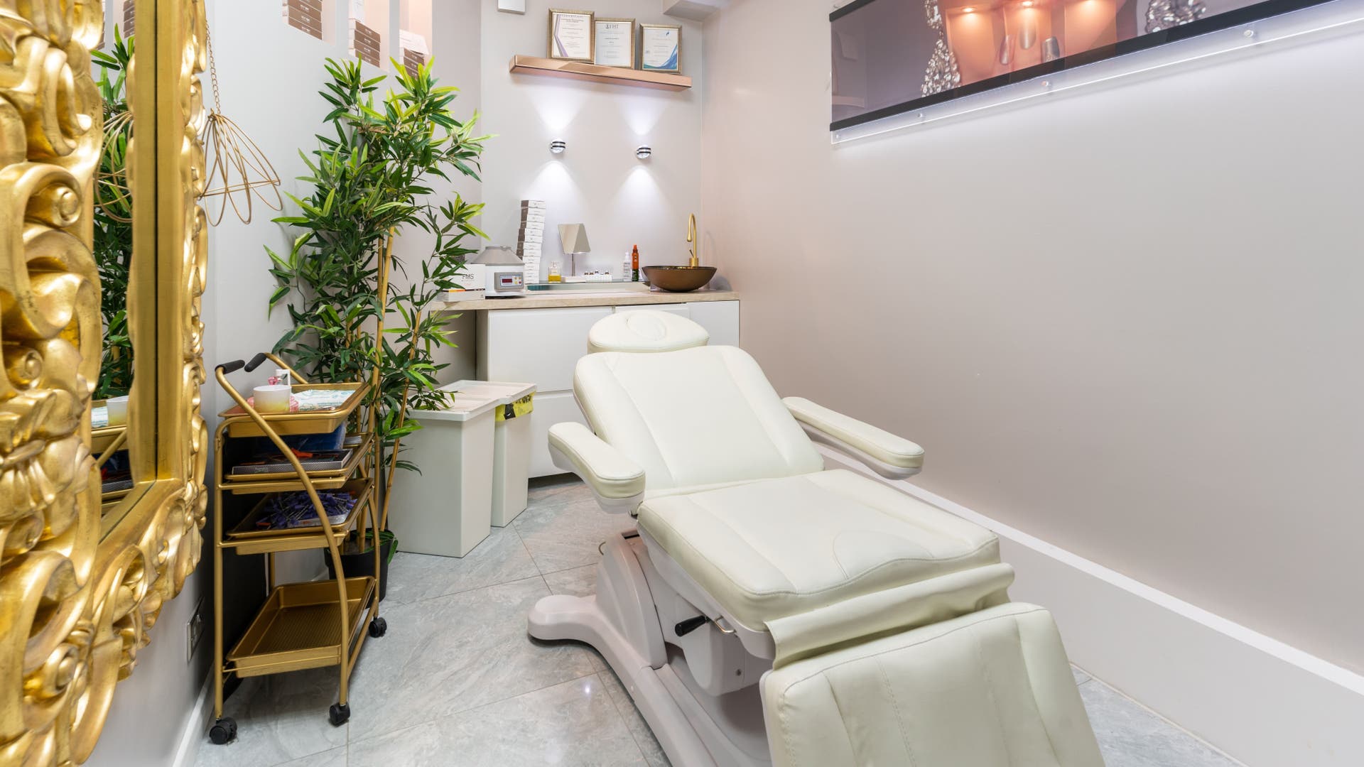 Luxurious treatment room at Trends Aesthetic Beauty Salon in London, England, GB with plush white chair.