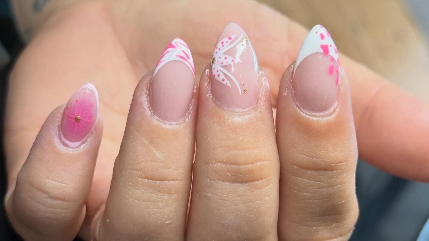 Elegant floral nail designs at Studio Eleven, Durban, Kwazulu-natal, ZA showcase artistry and precision.