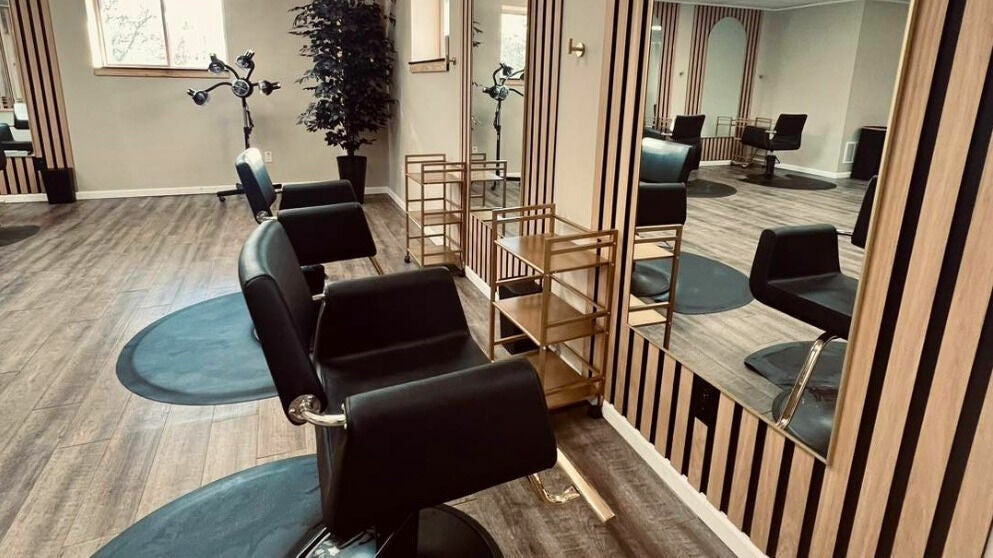 Chic interior at The Babe Kave, Flint, Michigan, US with stylish salon chairs and modern decor.