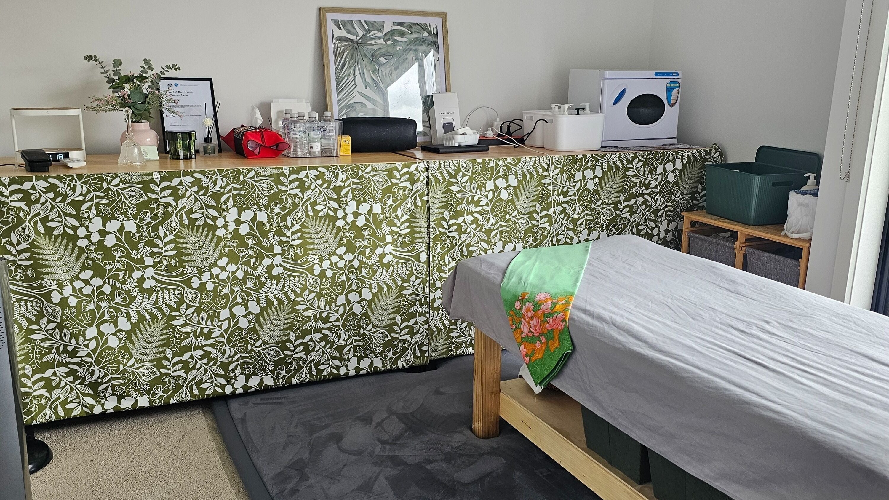 Relaxing therapy room at Muscle Reset, Melbourne, Victoria, AU with a decorated massage table.