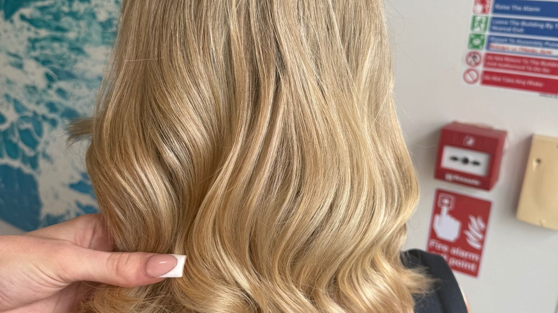 Blonde waves styled at Hair By Caitlyn, Hull, England, GB, showcasing expert hairdressing techniques.