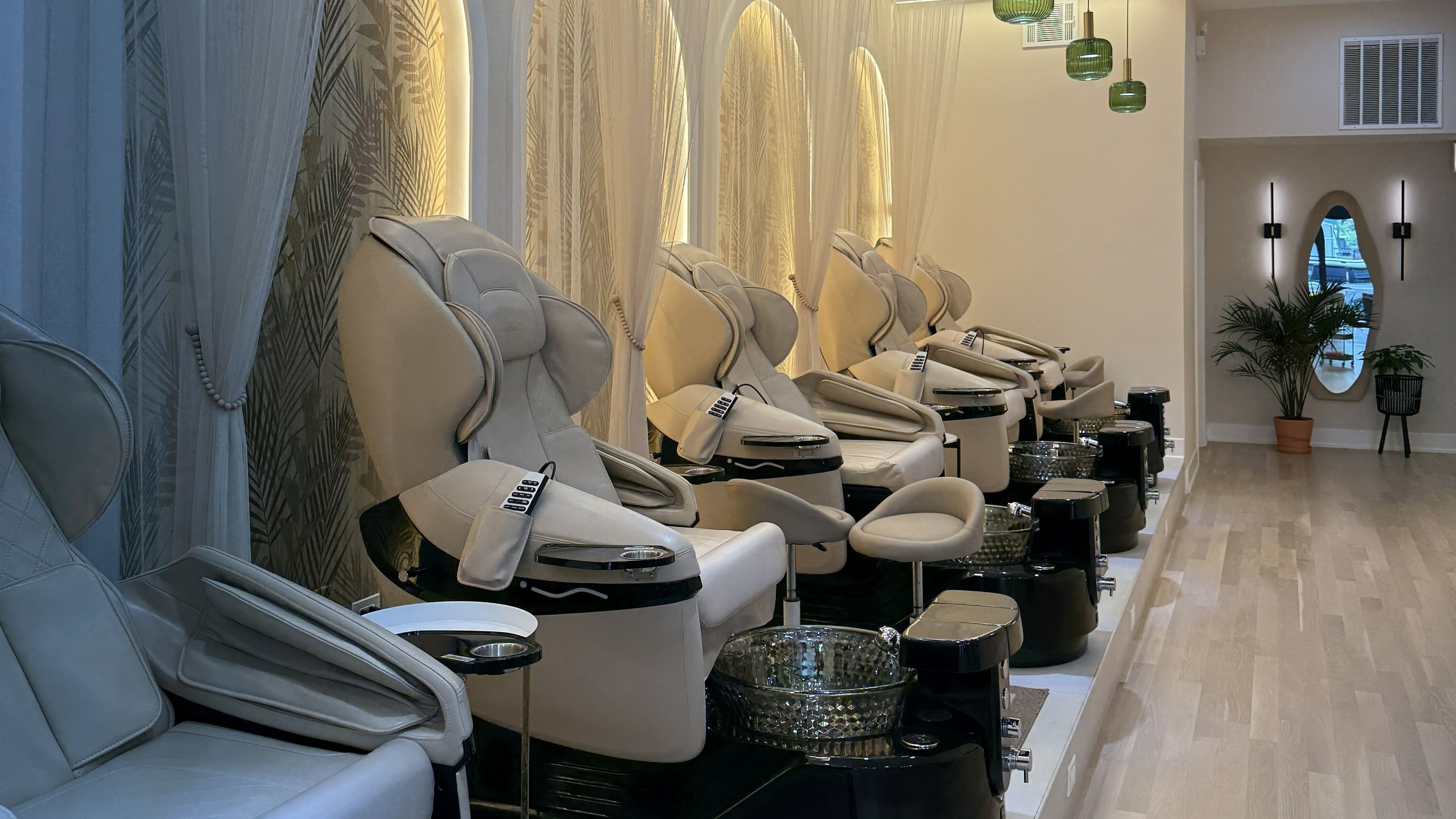 Elegant pedicure chairs at Mishelle's Nail Spa, Chicago, Illinois, US, offering luxury and comfort in a serene setting.