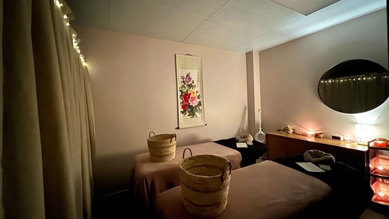 Cozy massage room at Kireina Beauty & Spa, Lower Hutt, Wellington Region, NZ with soft lighting and decor.