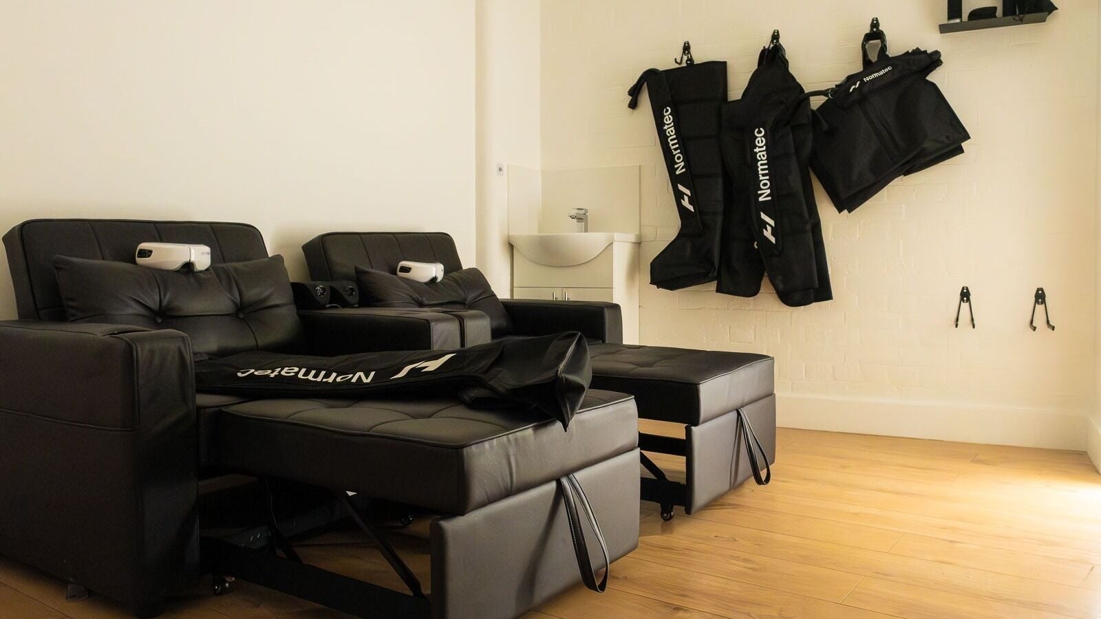 Luxurious massage chairs in Recovery Cave, London, England, GB offer ultimate relaxation and comfort.