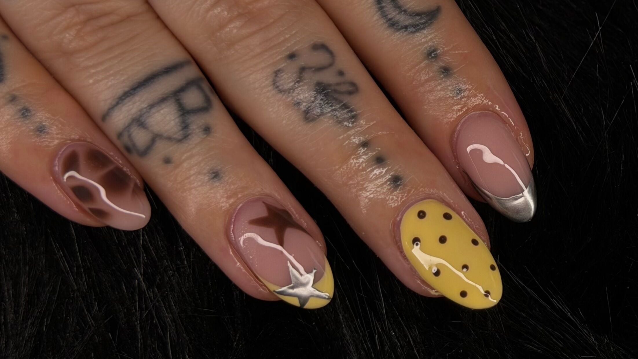 Unique nail art design at Buff’It by Chloe, Craigieburn, Victoria, AU showcasing intricate patterns and vibrant colors.