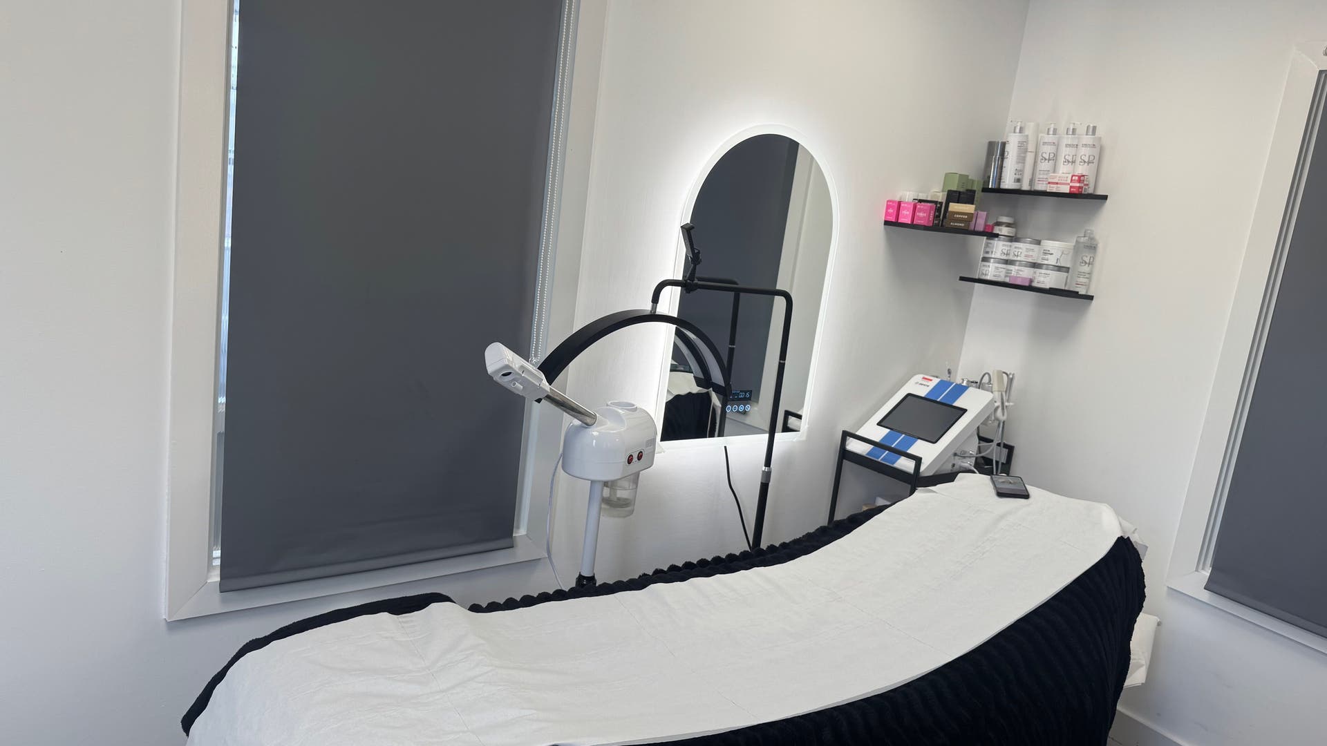 Modern treatment room at Mehru's Beauty - Great Eastern Street, London, England, GB. Relaxing and well-equipped.