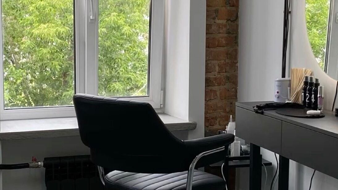 Modern salon chair by a window in Mimi J Studio, Neutral Bay, New South Wales, AU.