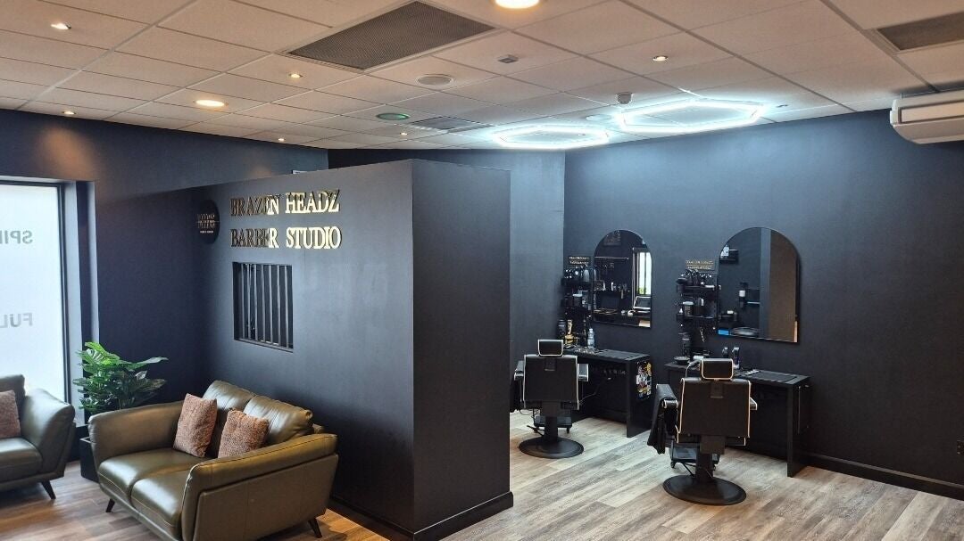 Modern interior of Brazen Headz Barber Studio, Limerick with stylish seating and barber stations.