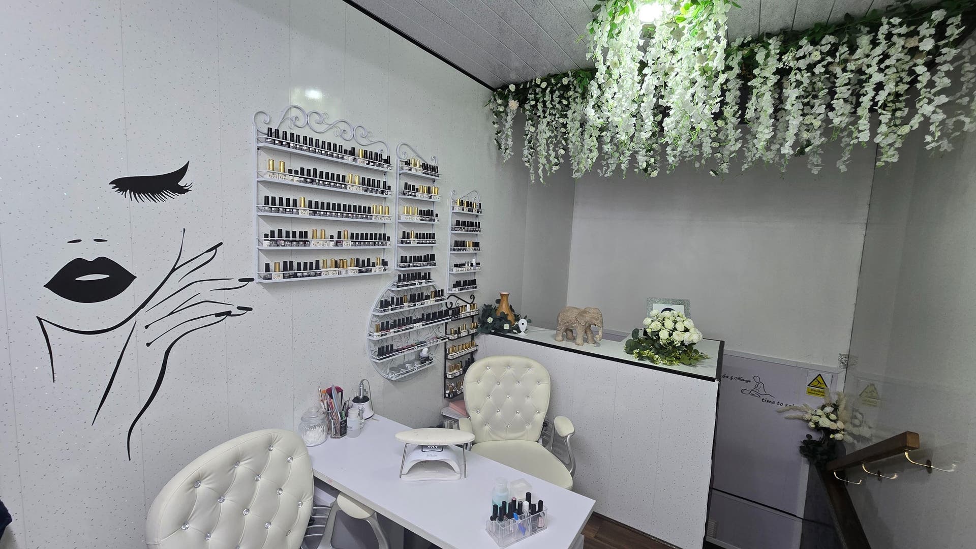 Chic nail station with elegant decor at Vilara Beauty in Glasgow, Scotland, GB, offering a relaxing ambiance.
