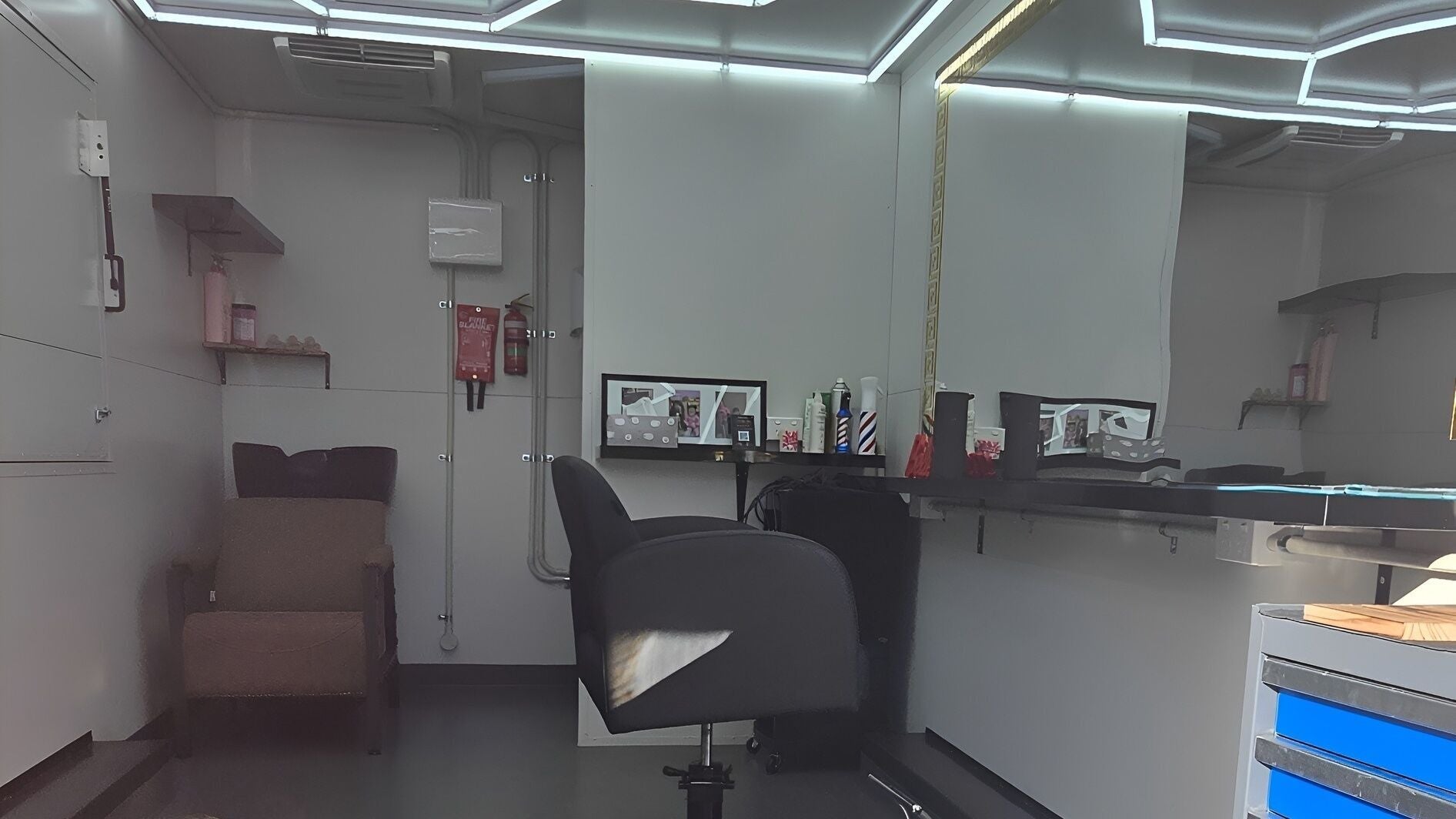 Interior salon space at Boss Lady Hair, Melbourne, Victoria, AU with a stylish styling chair and modern decor.